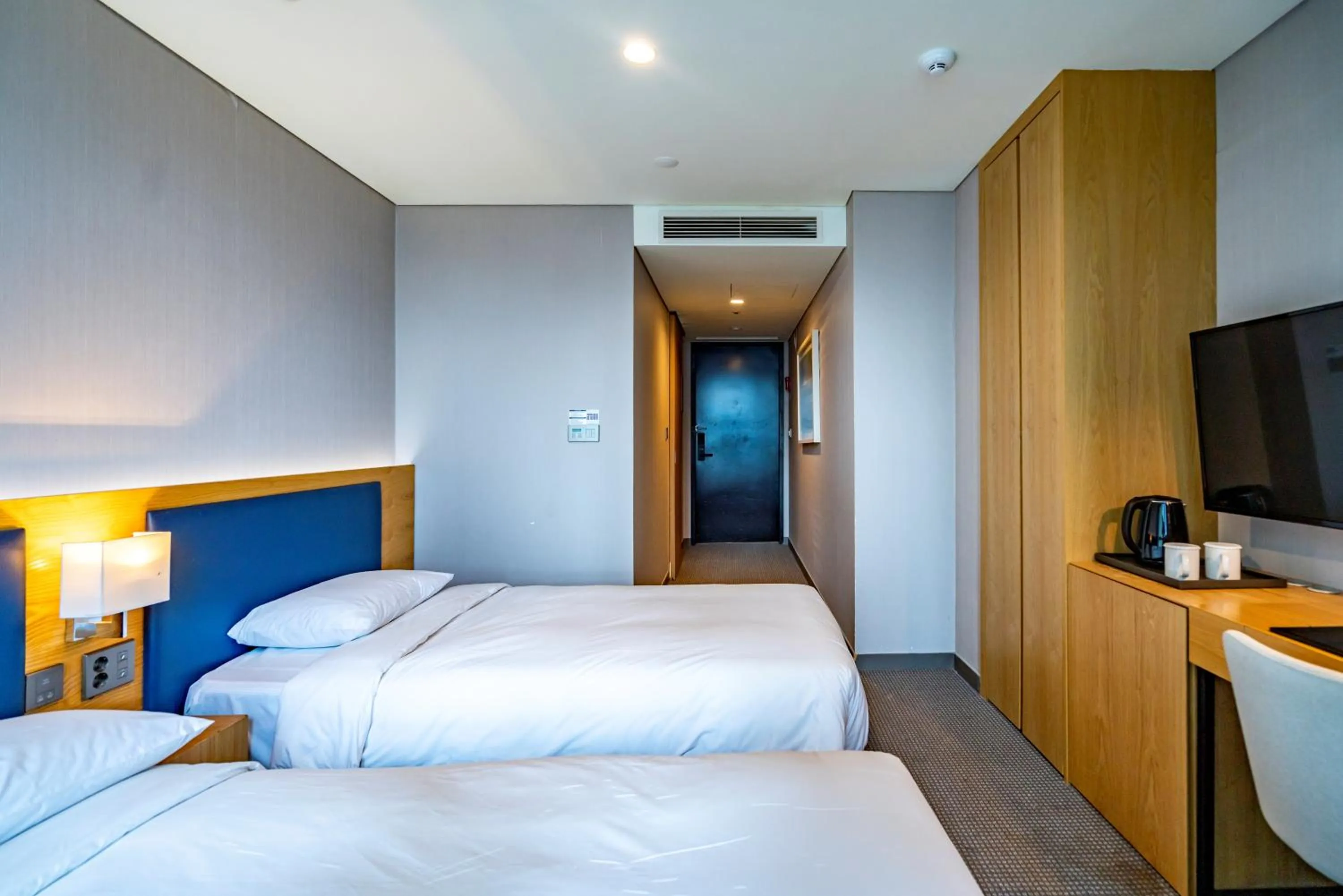 Bed in Centum Business Hotel