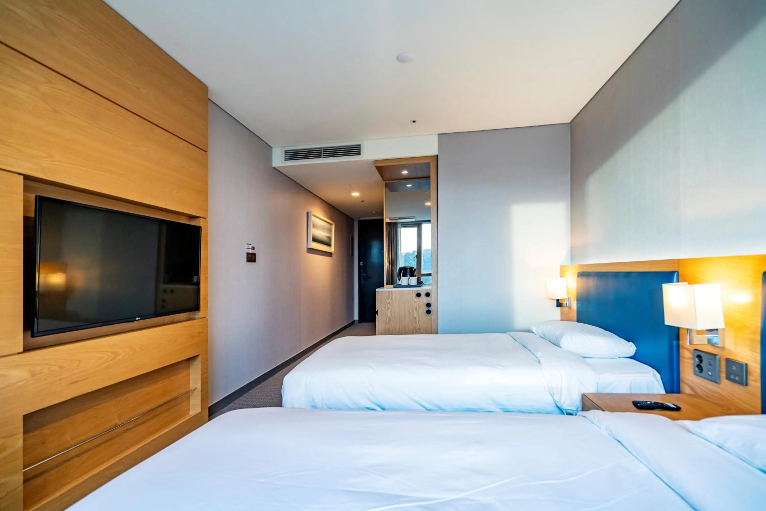 Bed in Centum Business Hotel