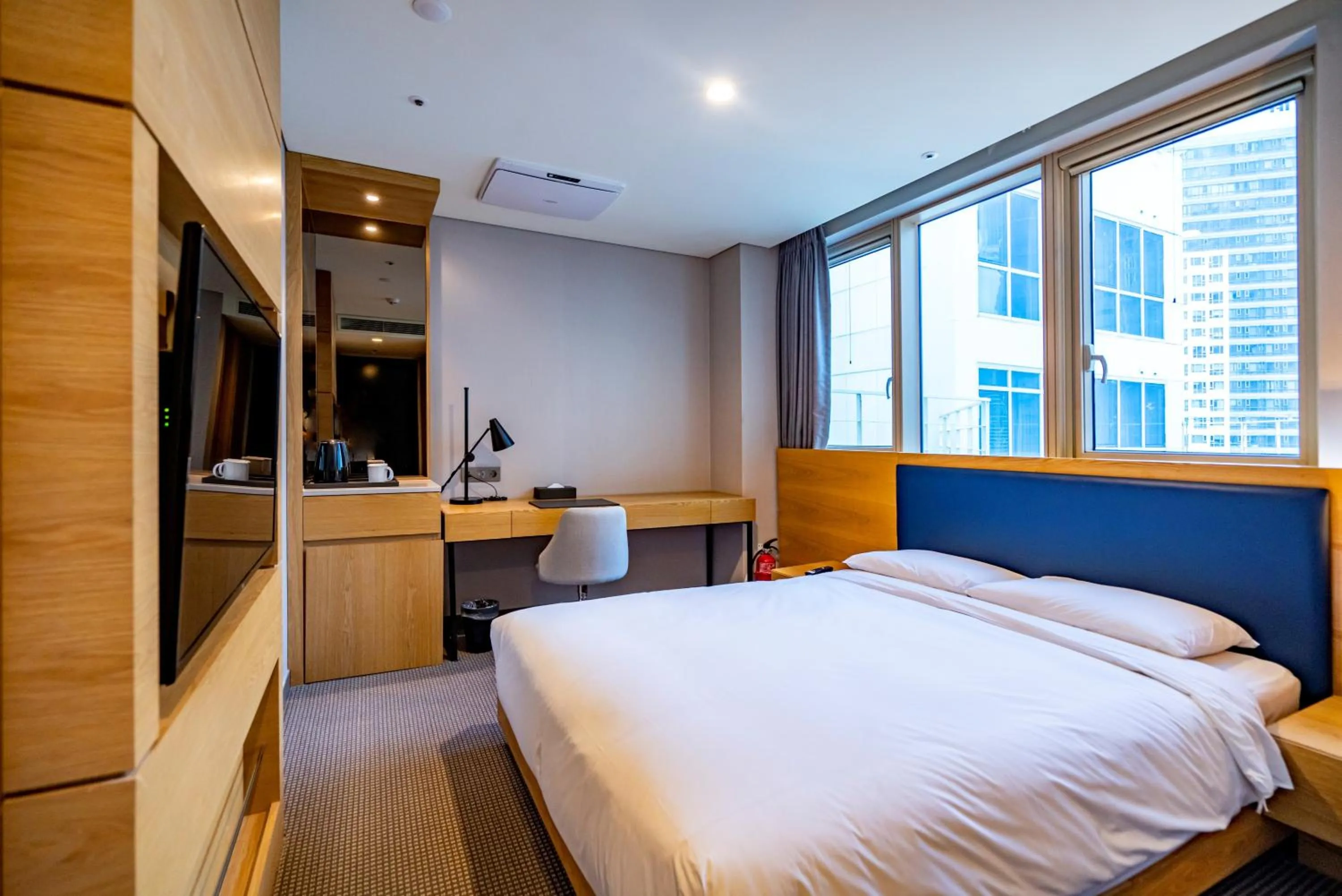Bedroom, Bed in Centum Business Hotel