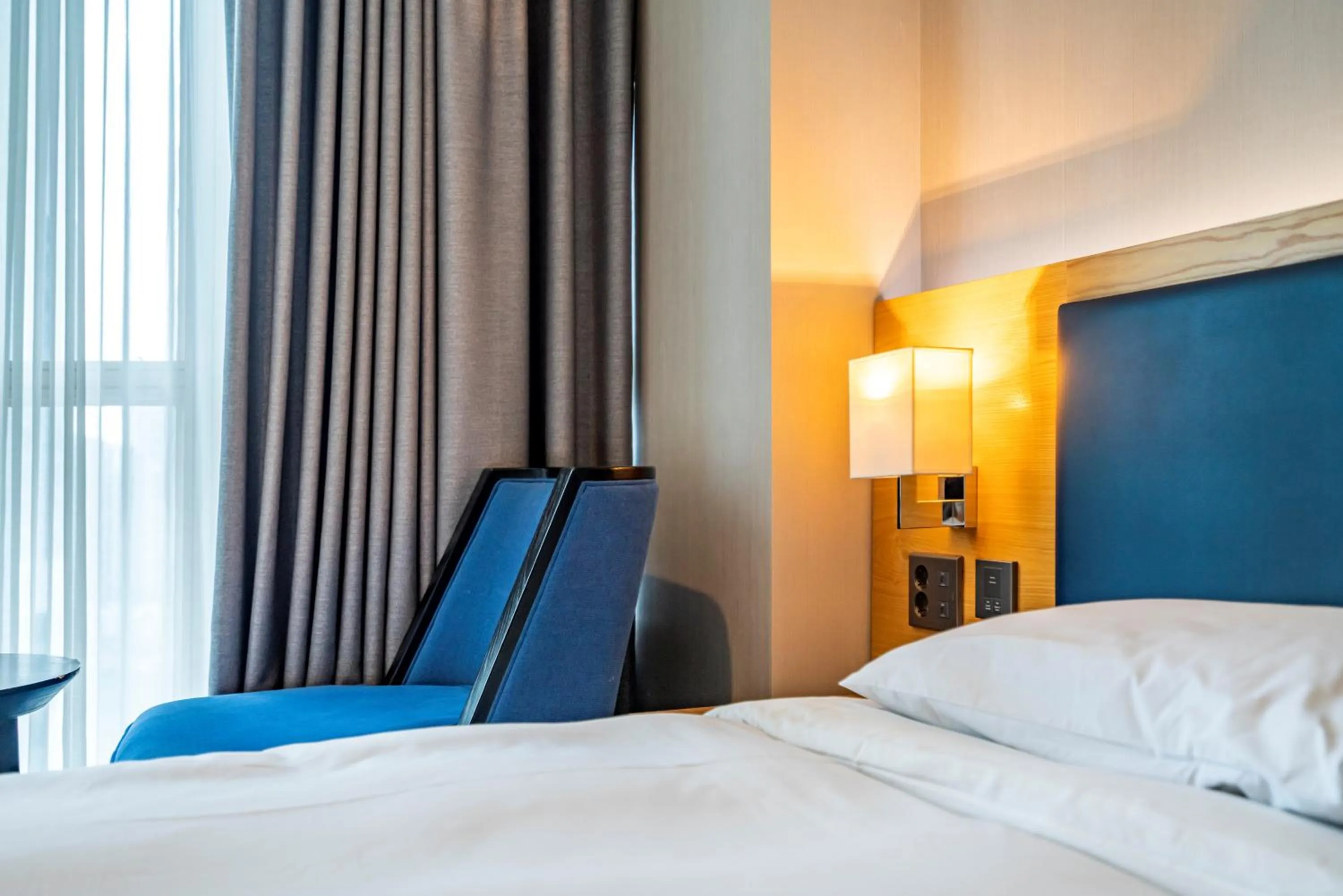 Bed in Centum Business Hotel