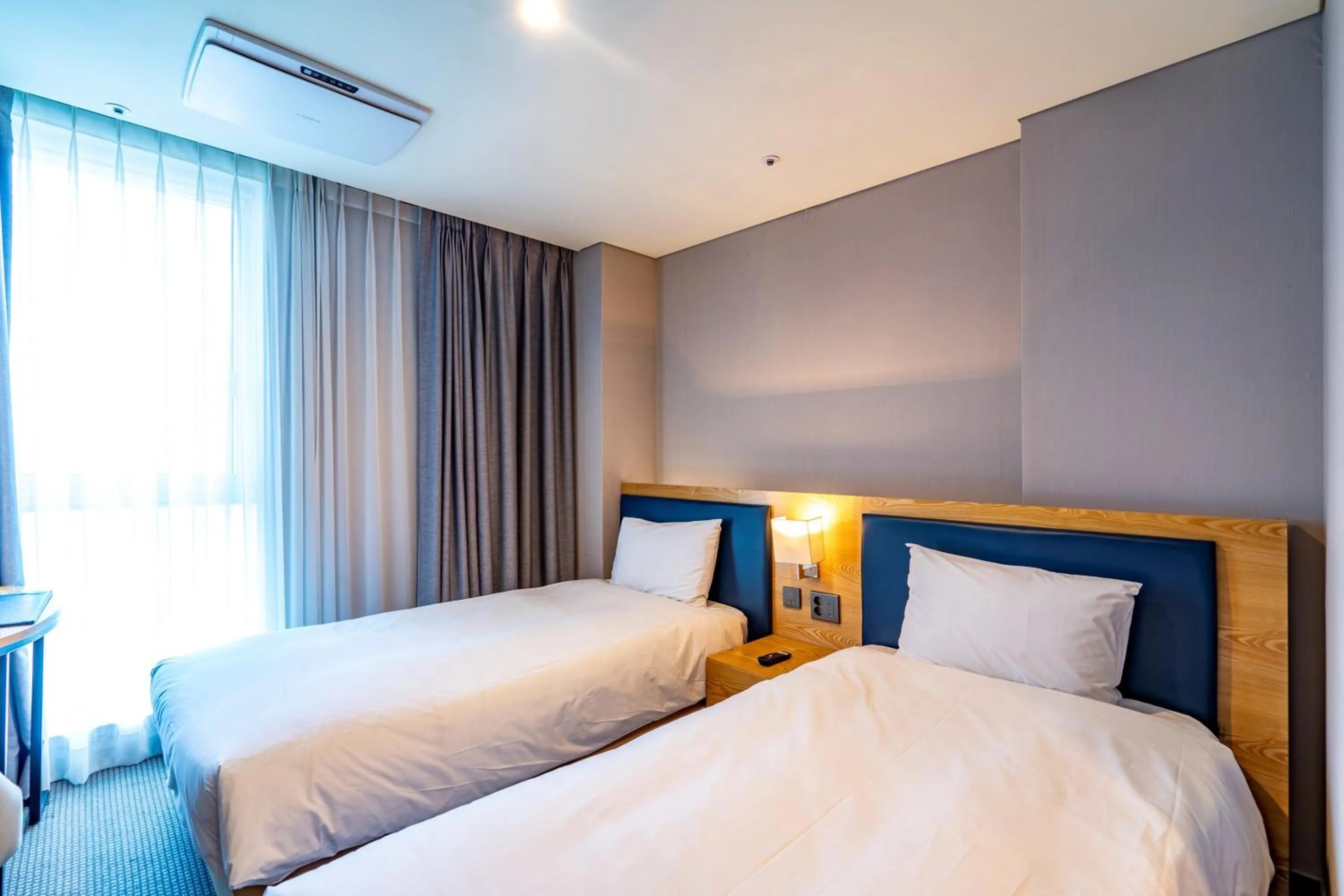 Bed in Centum Business Hotel