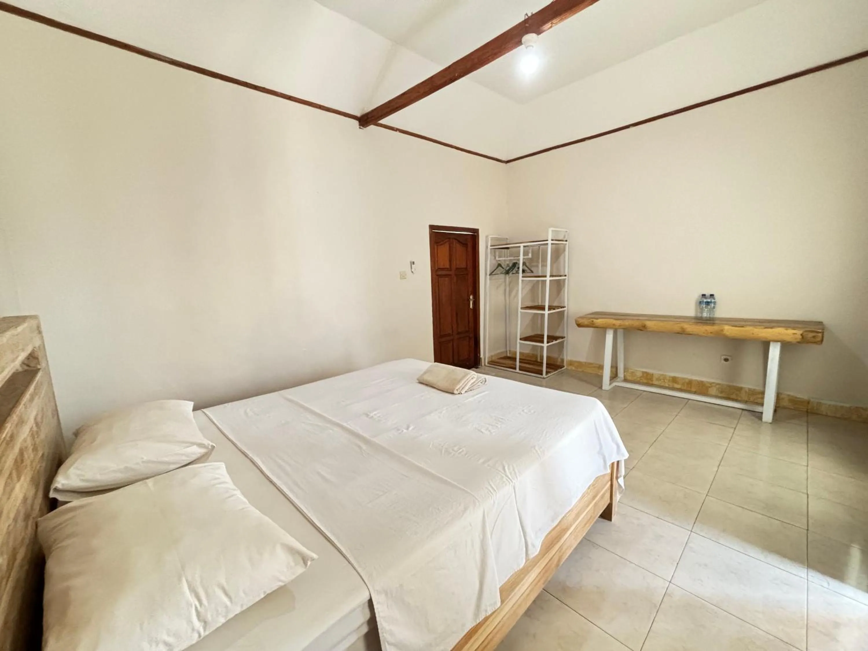 Bed in Krisna Bungalows and Restaurant