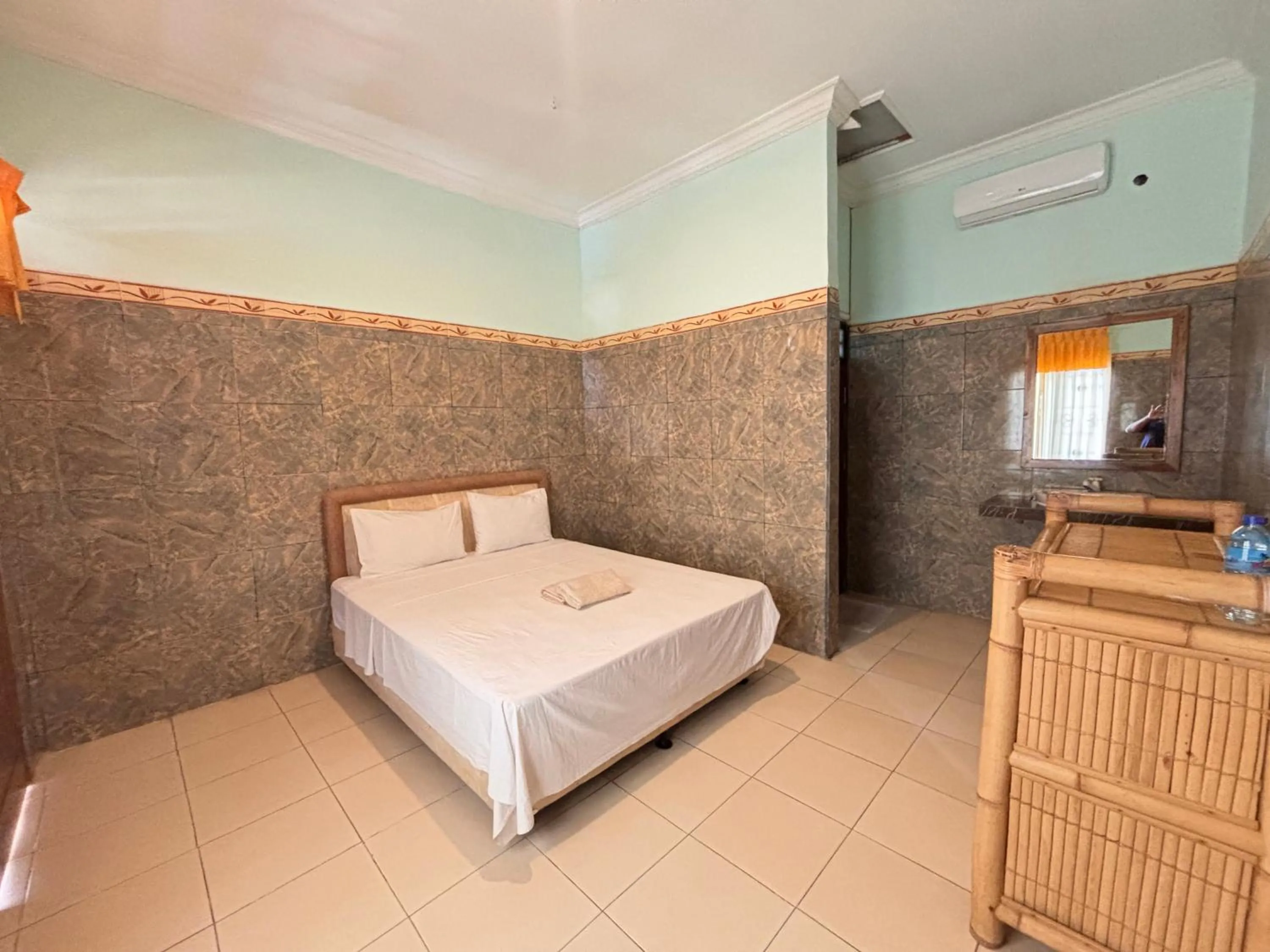 Bed in Krisna Bungalows and Restaurant