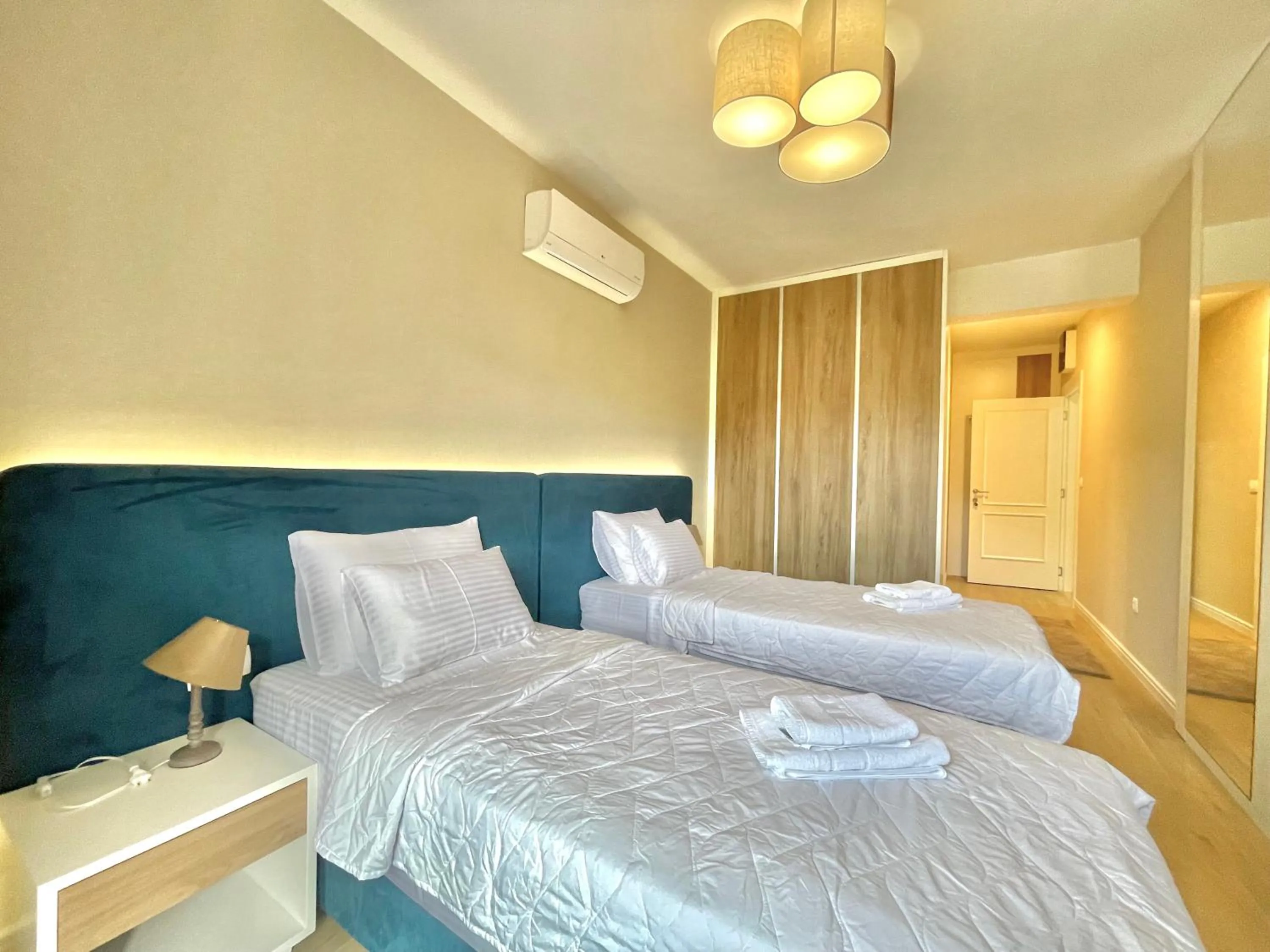 Bed in Comfort Apartments Pasha