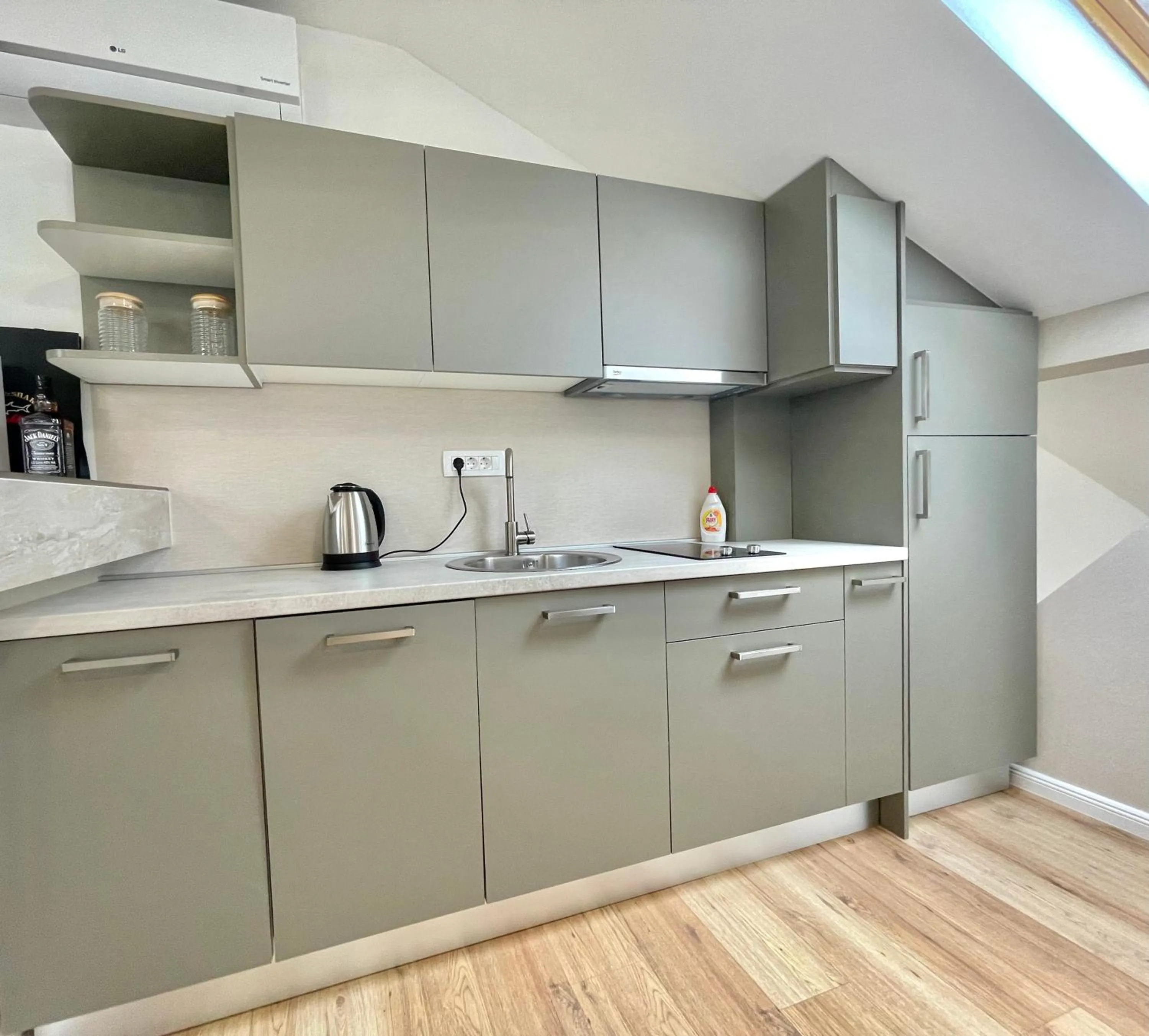 Kitchen or kitchenette in Comfort Apartments Pasha