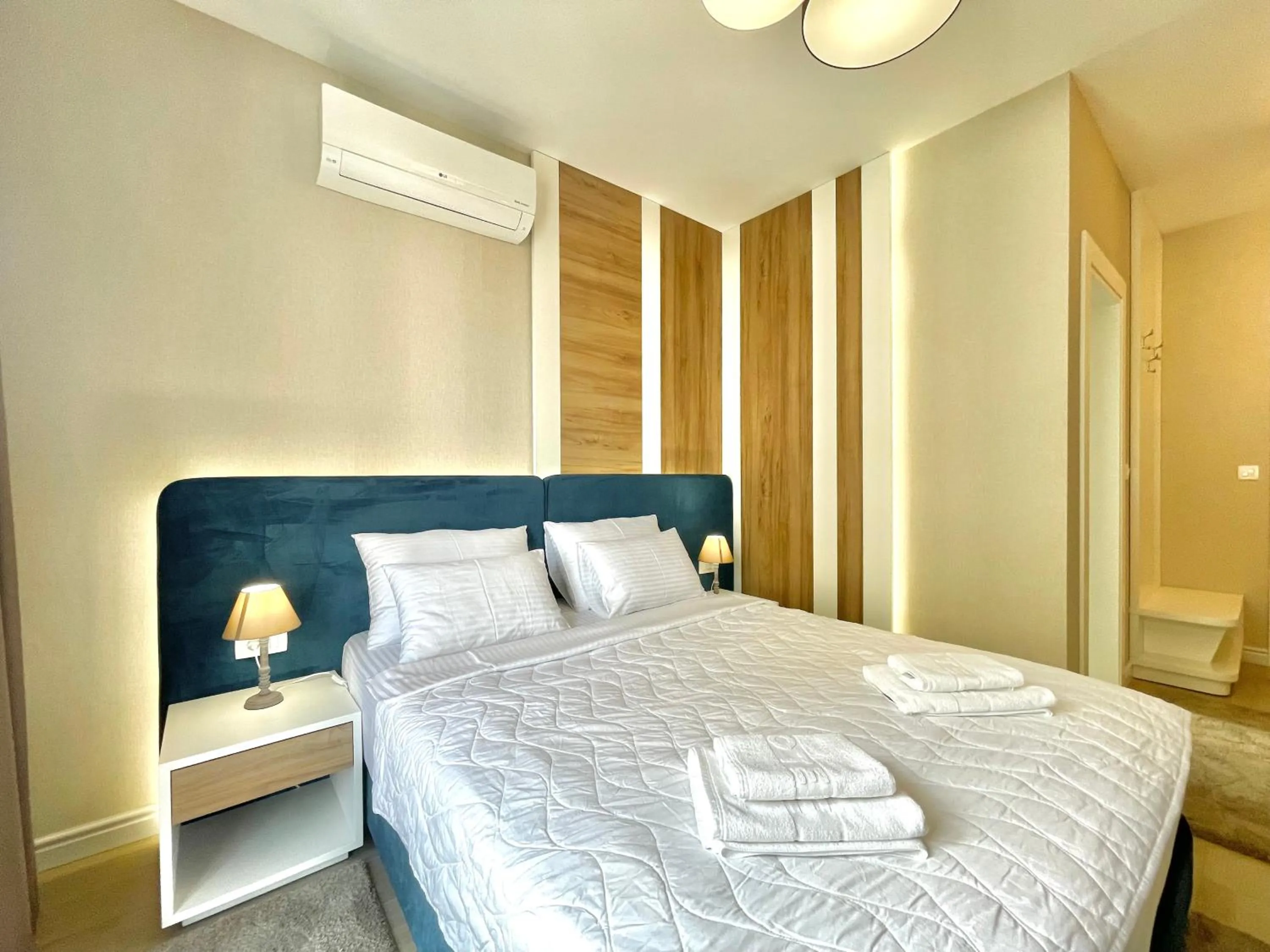 Bedroom, Bed in Comfort Apartments Pasha