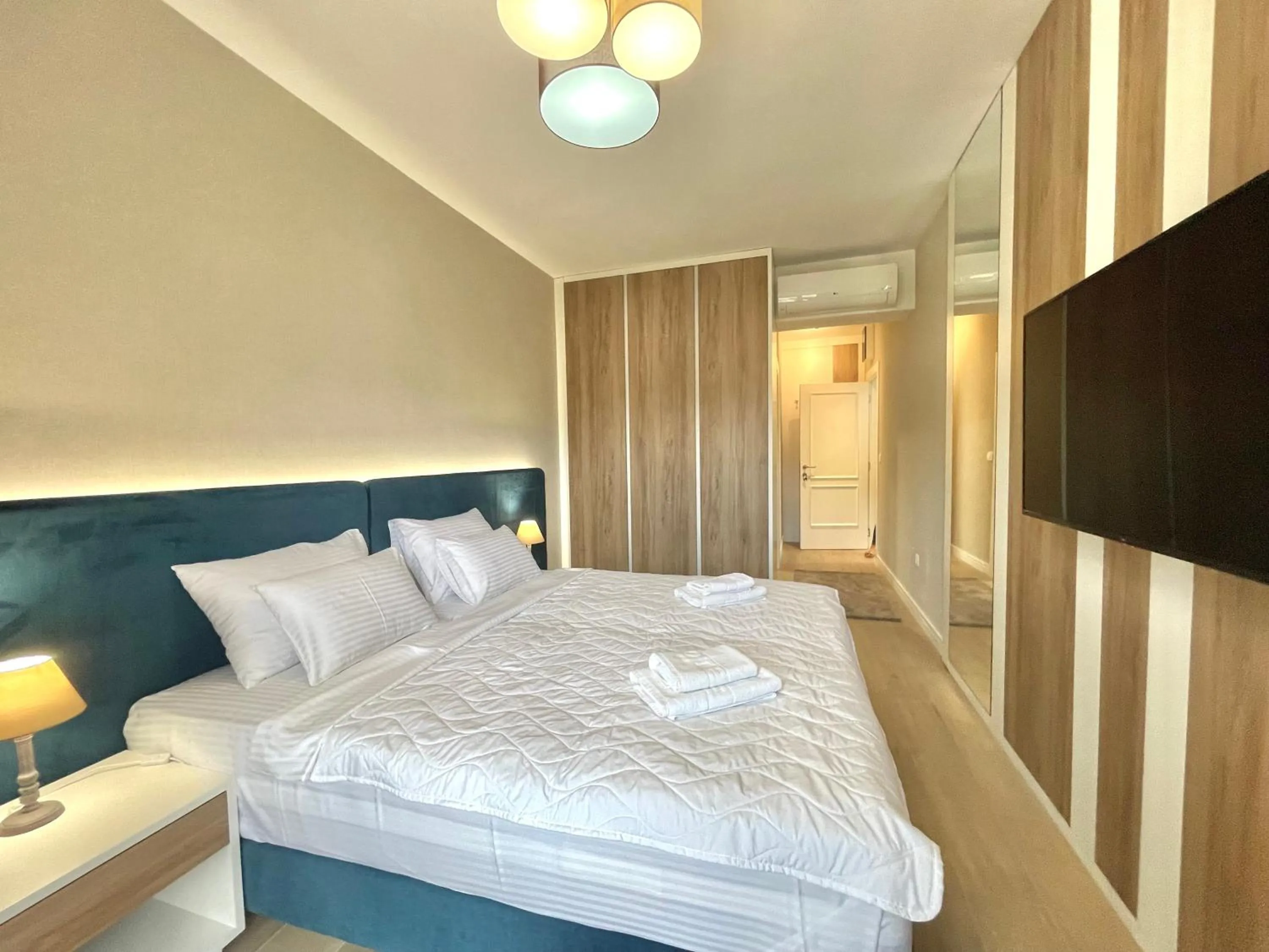 Bed in Comfort Apartments Pasha