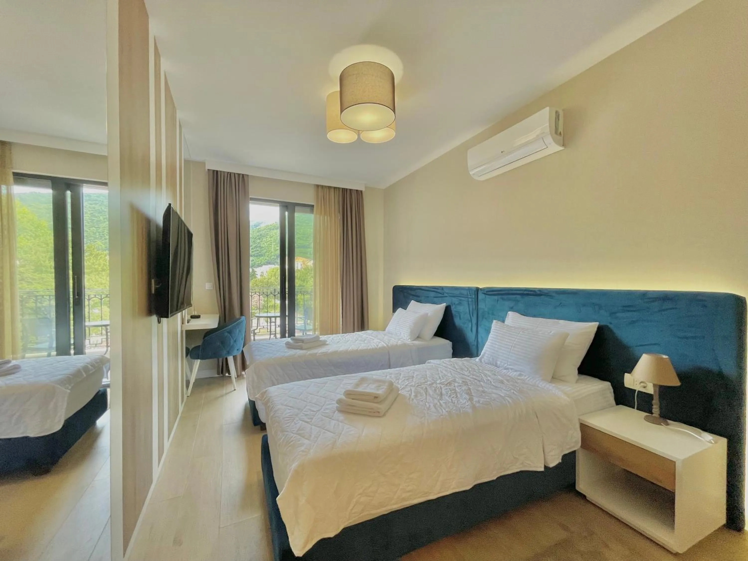 Bed in Comfort Apartments Pasha