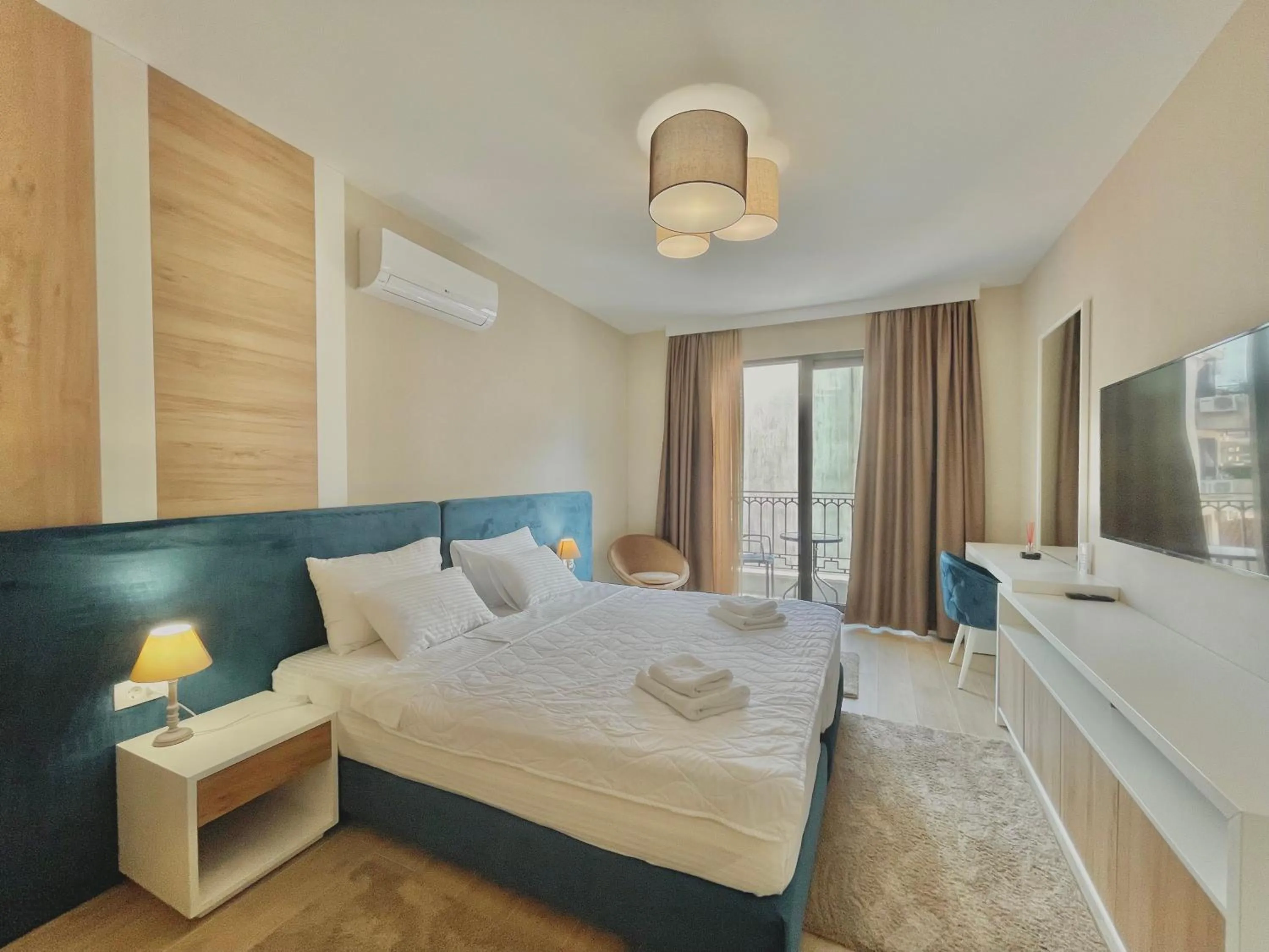 Bed in Comfort Apartments Pasha