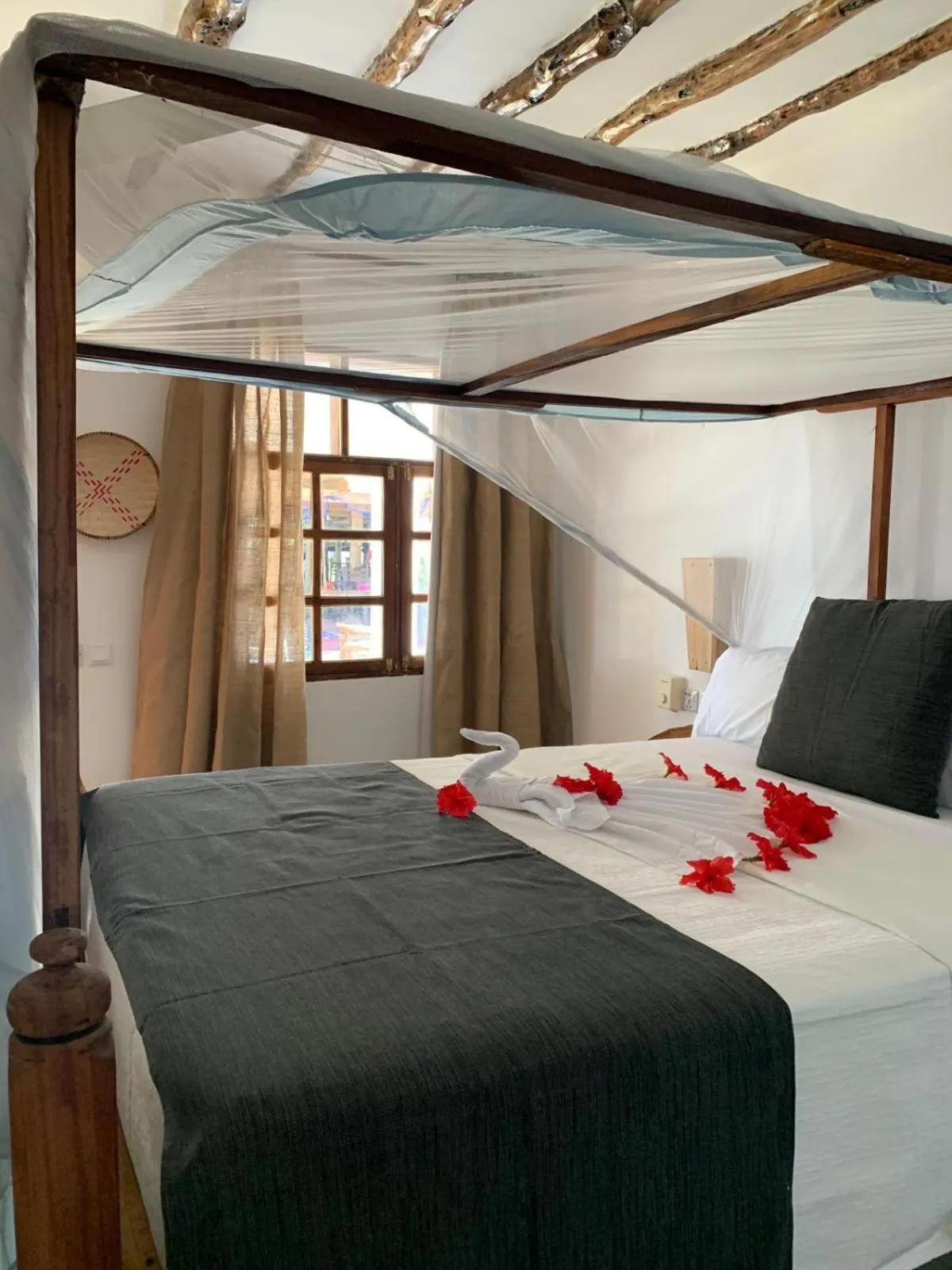 Property building, Bed in Nest Style Beach Hotel Zanzibar