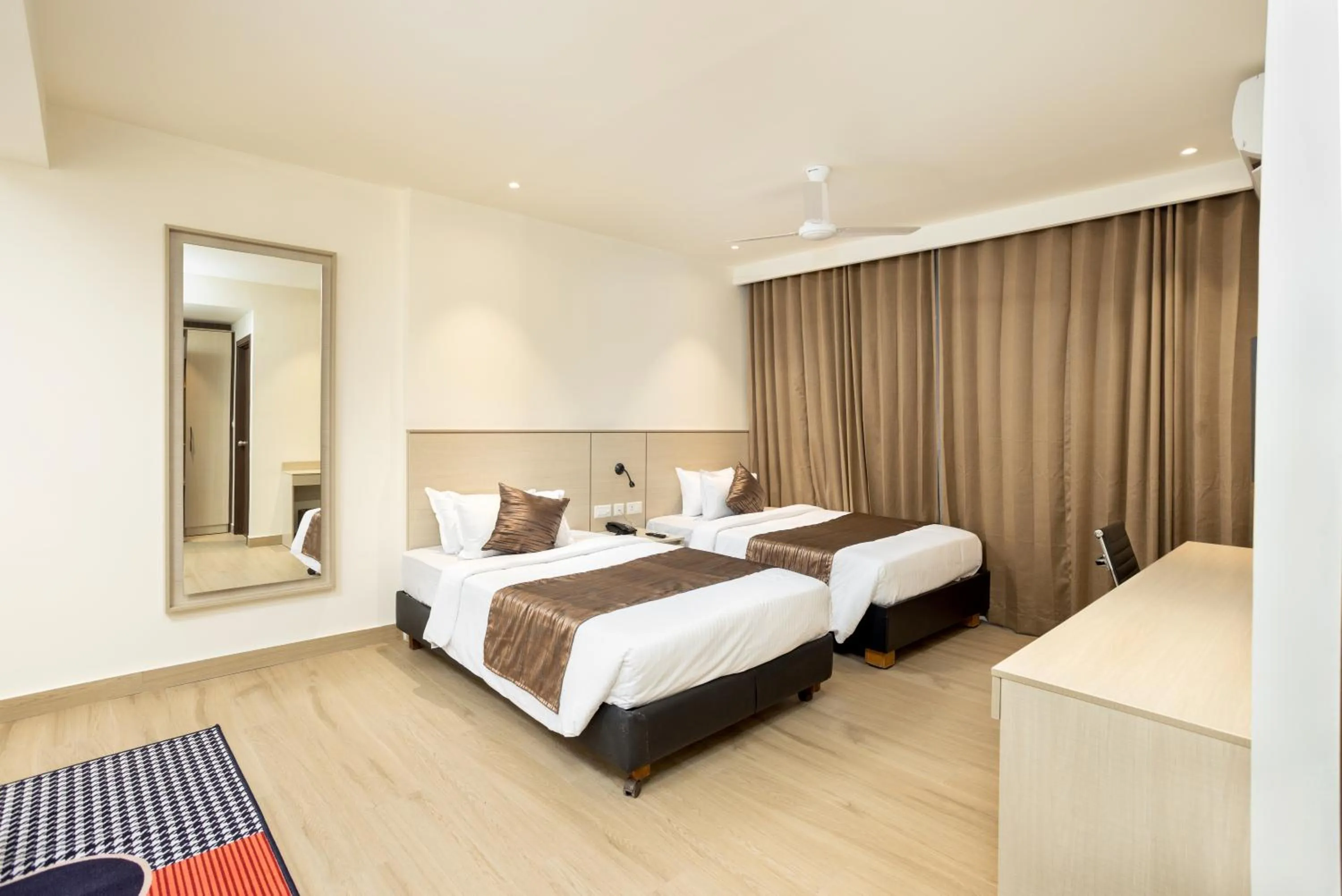 Bed in PRESIDENCY AIRPORT HOTEL