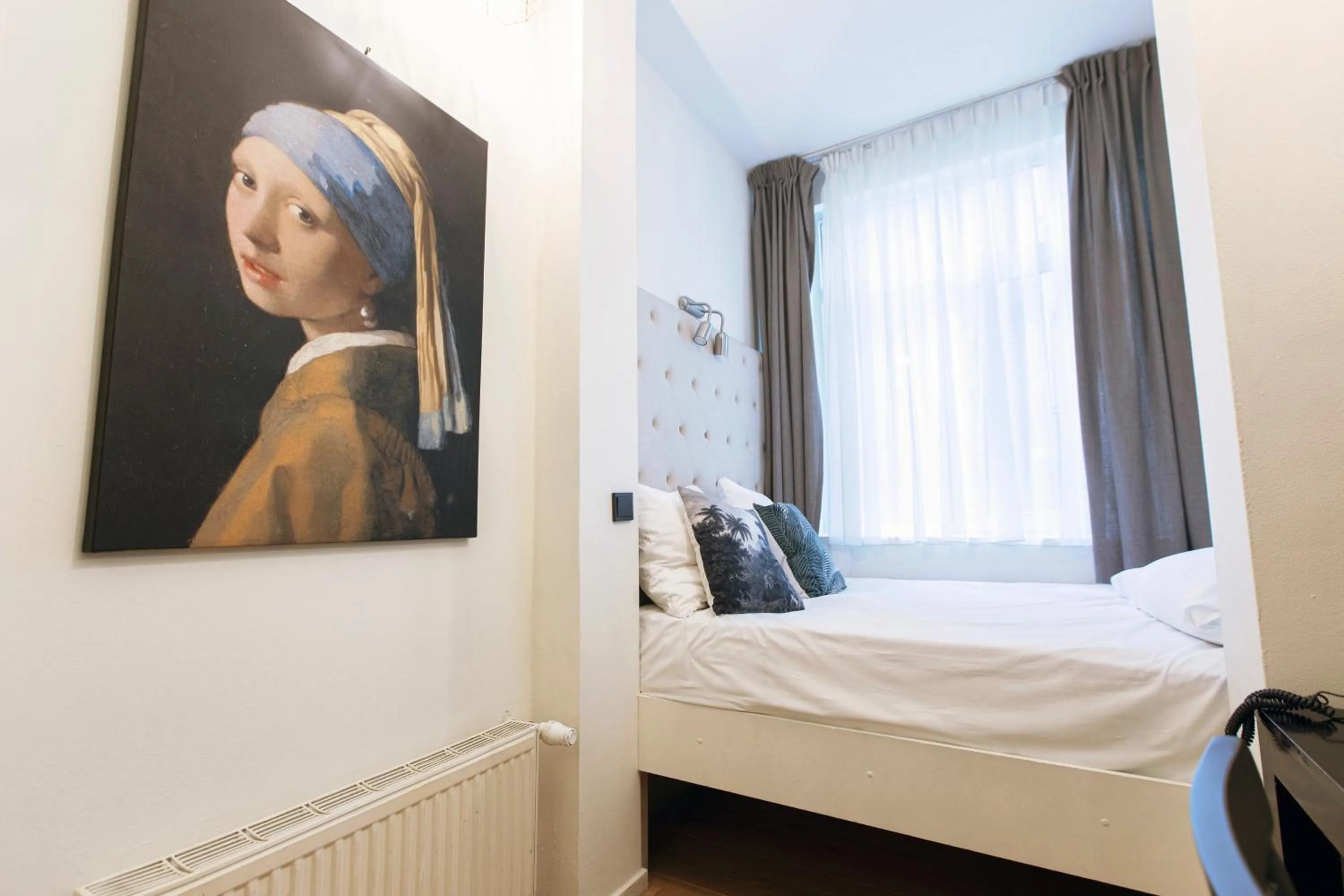 Decorative detail, Bed in Quentin Amsterdam Hotel