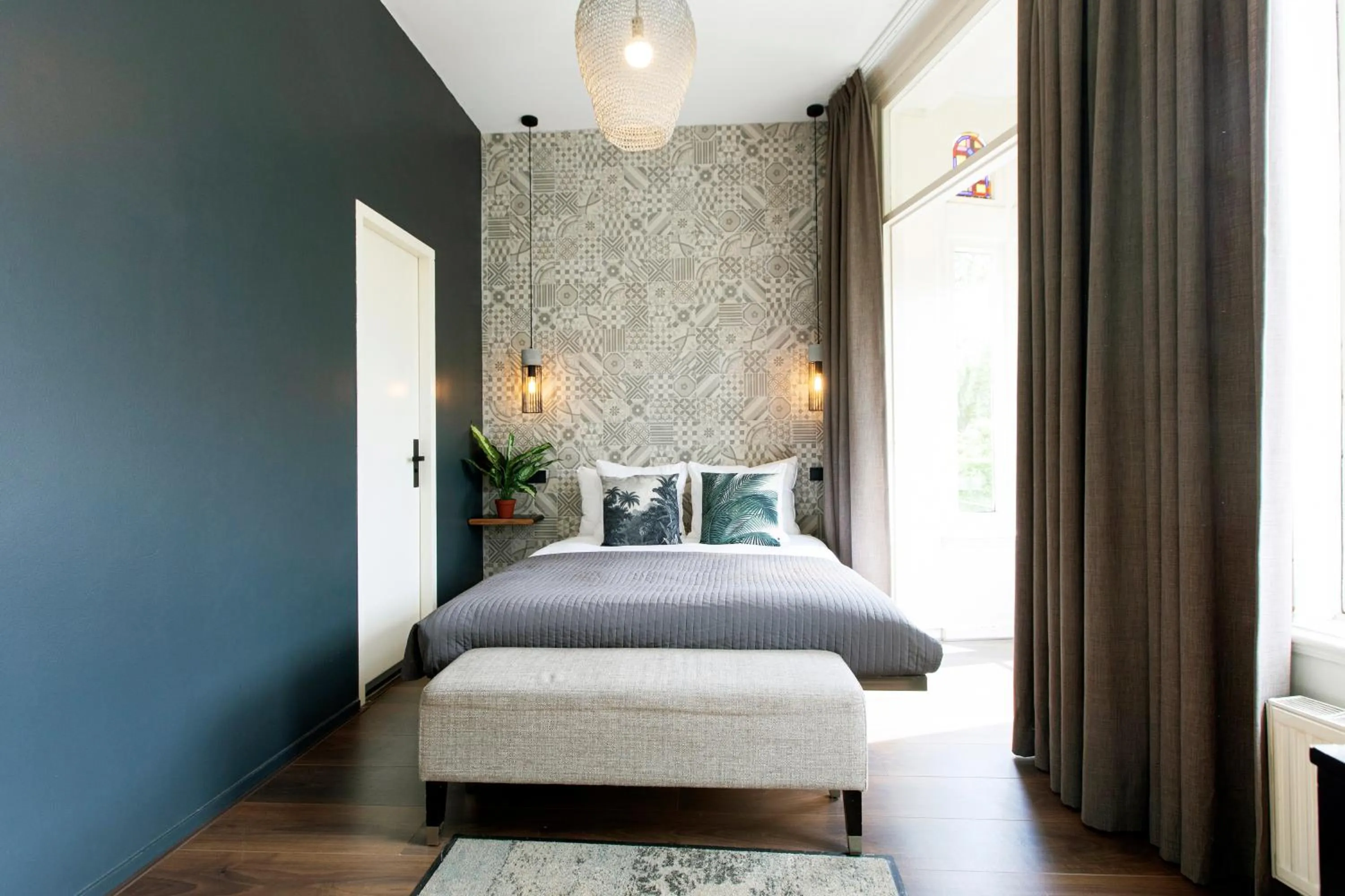 Bed in Quentin Amsterdam Hotel