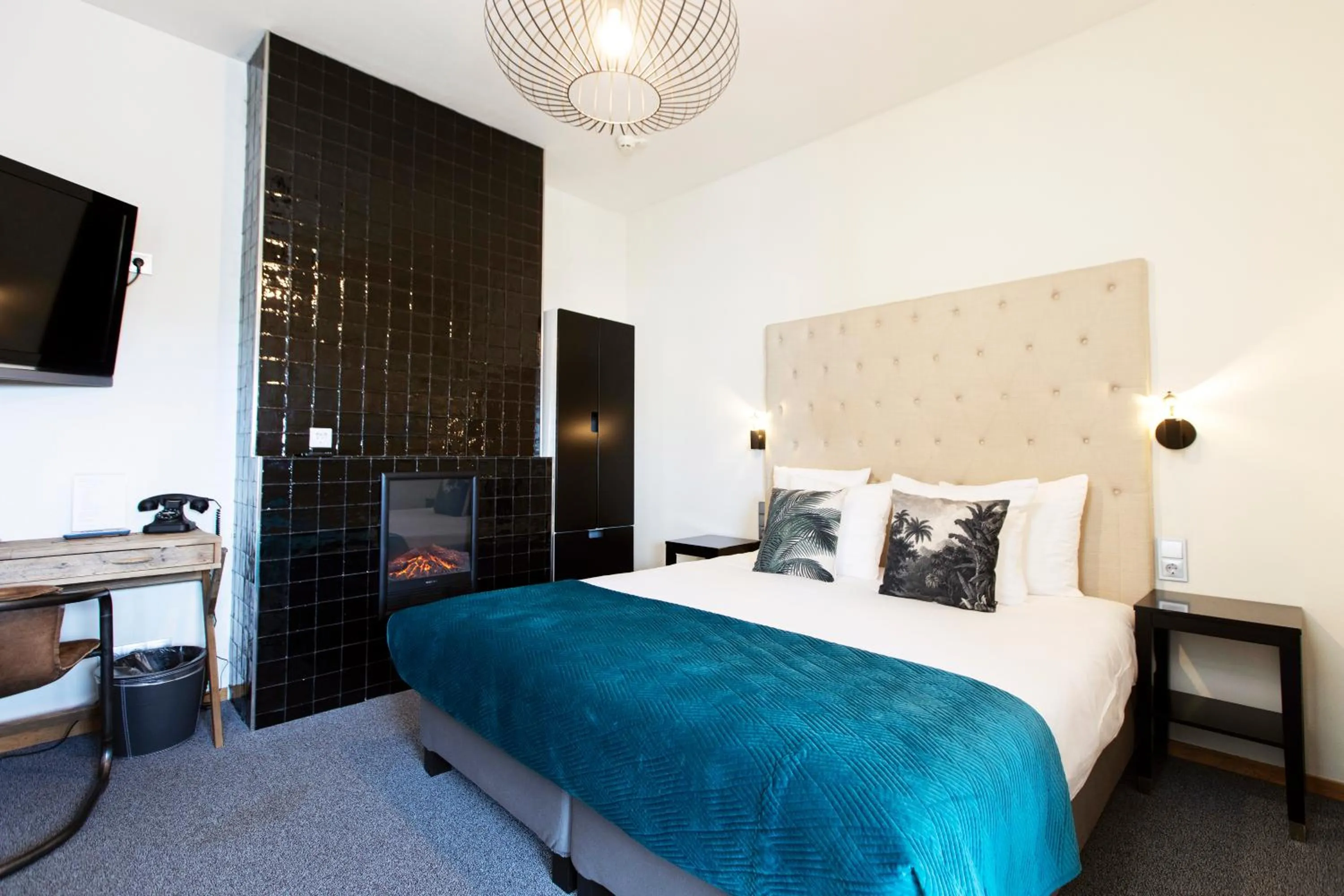 Bed in Quentin Amsterdam Hotel