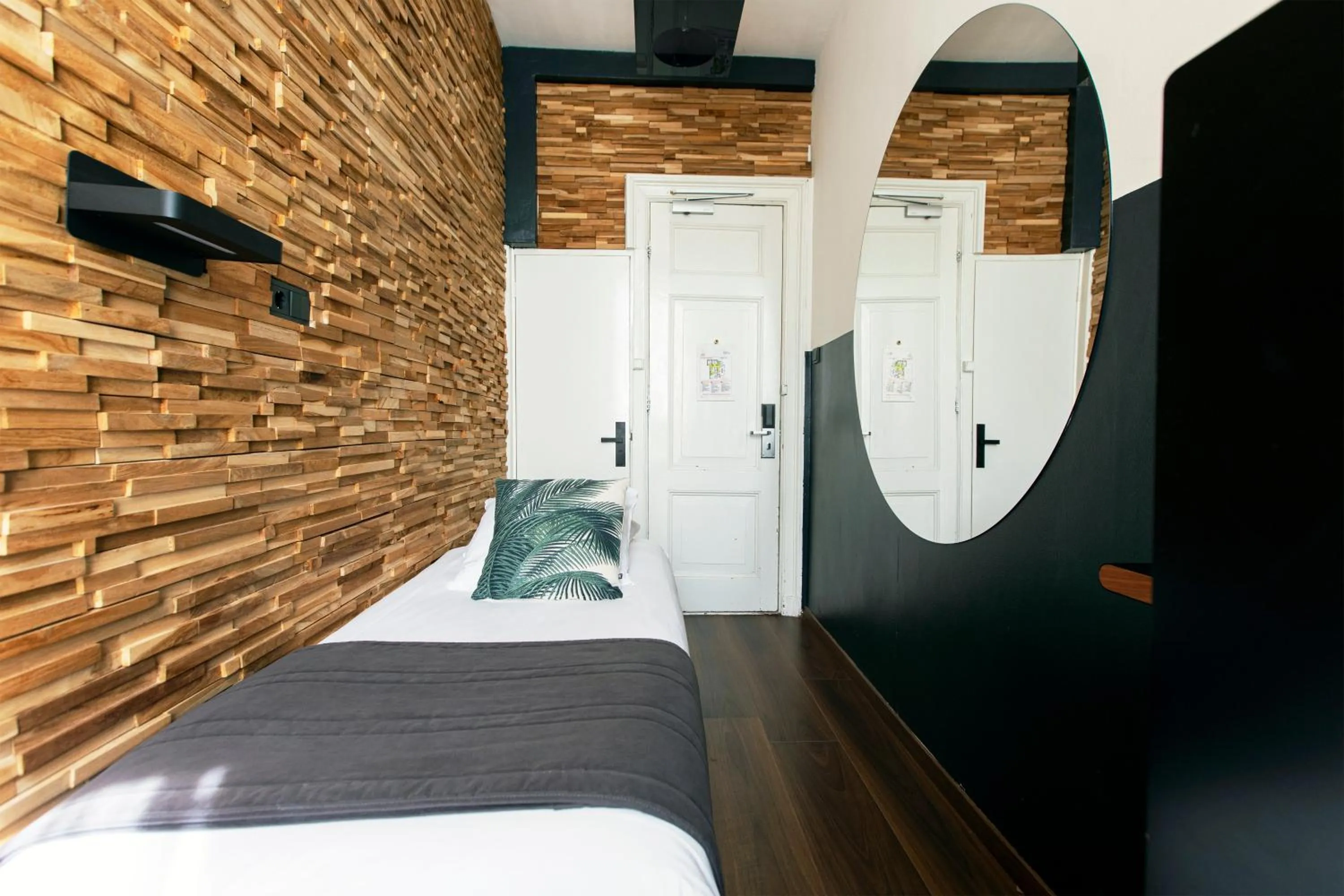 Bed in Quentin Amsterdam Hotel