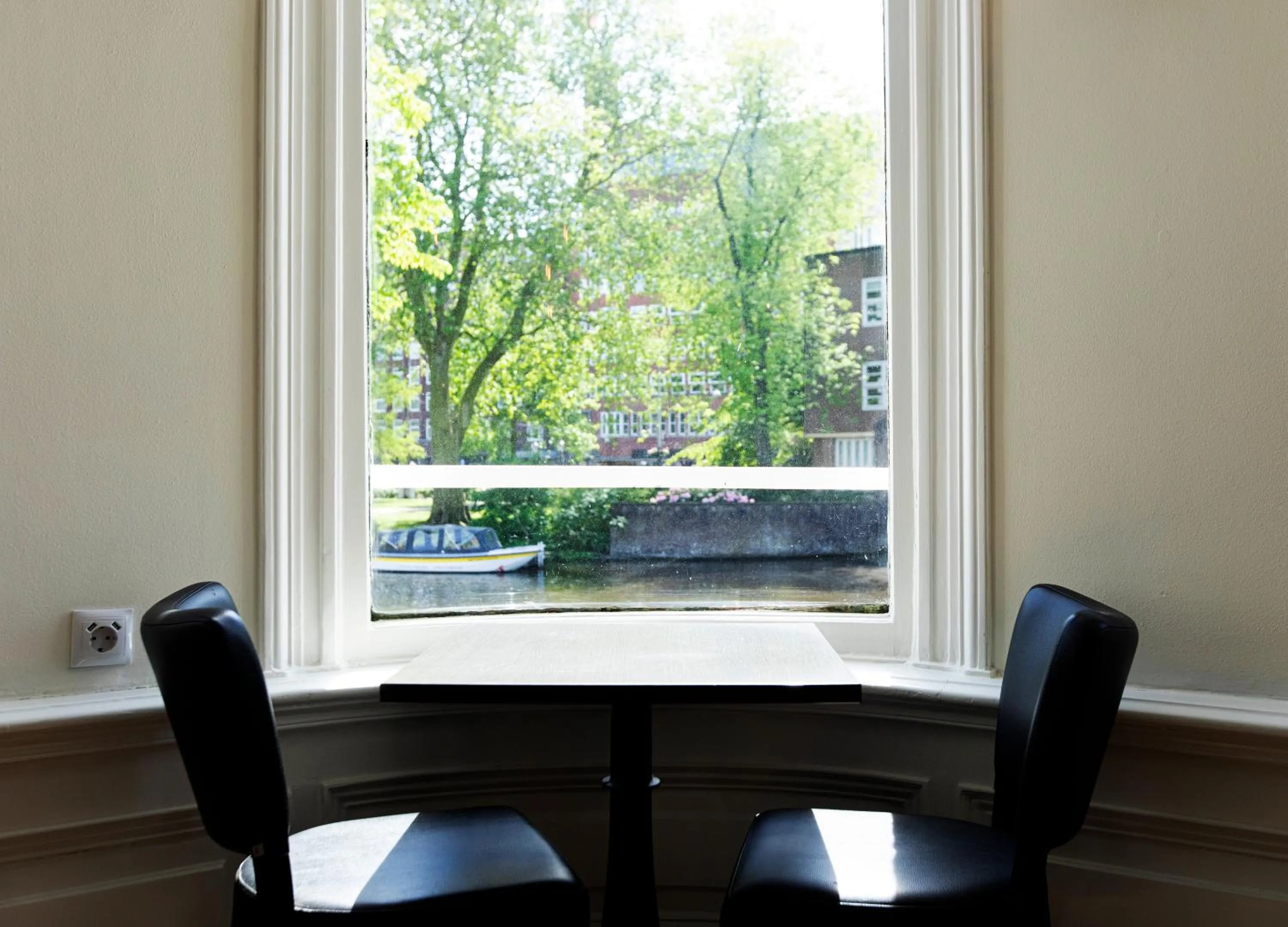 Seating area in Quentin Amsterdam Hotel