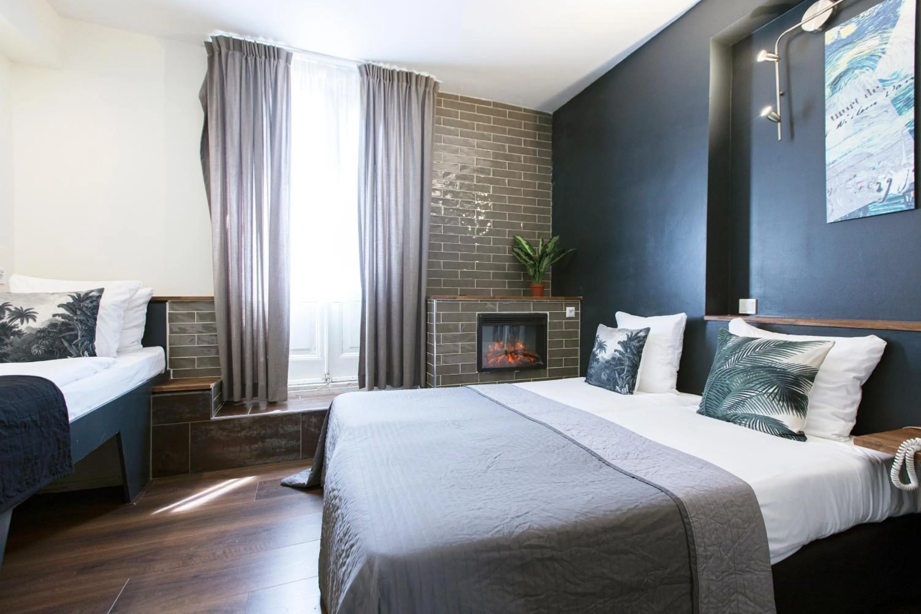 Bed in Quentin Amsterdam Hotel