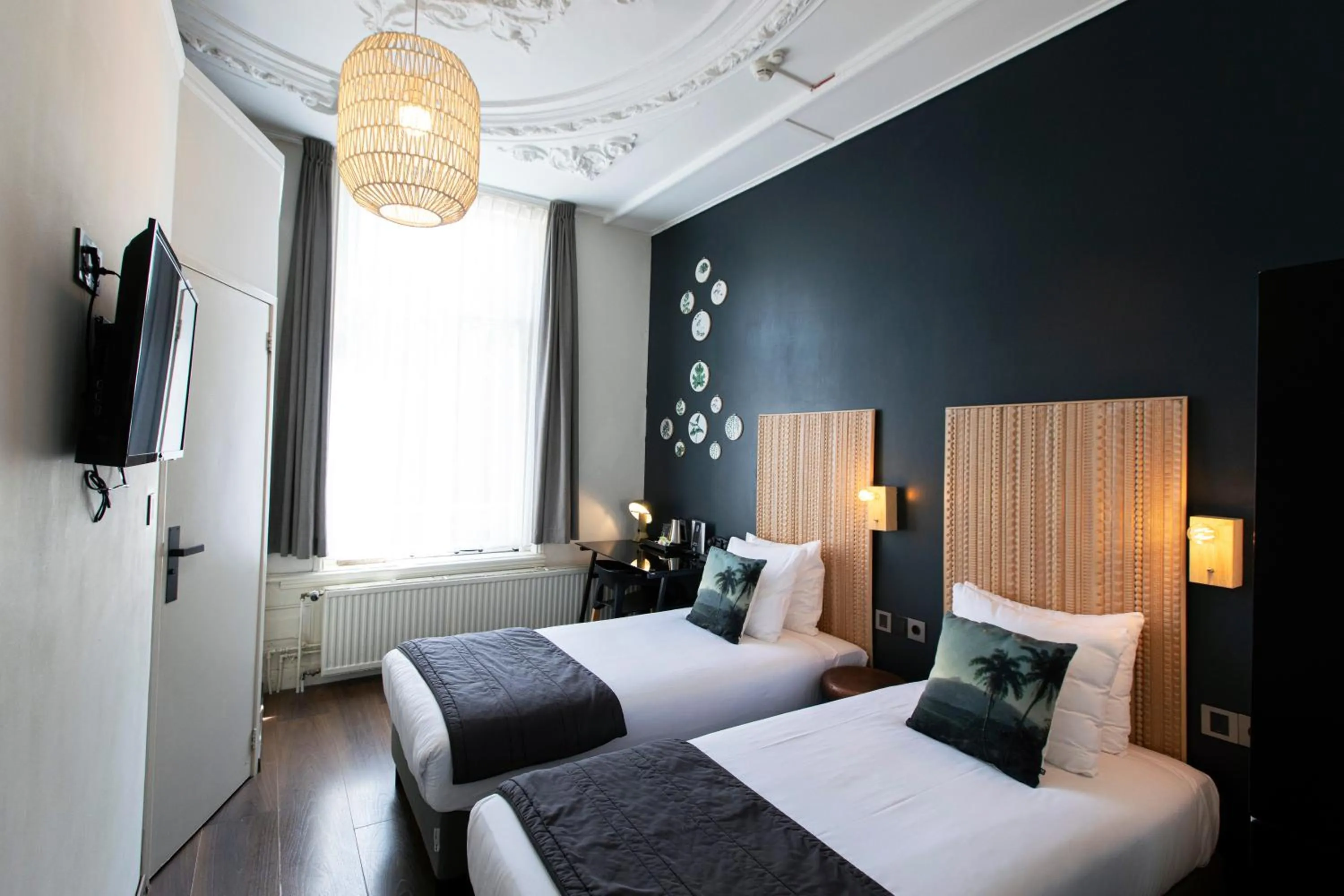 Bed in Quentin Amsterdam Hotel