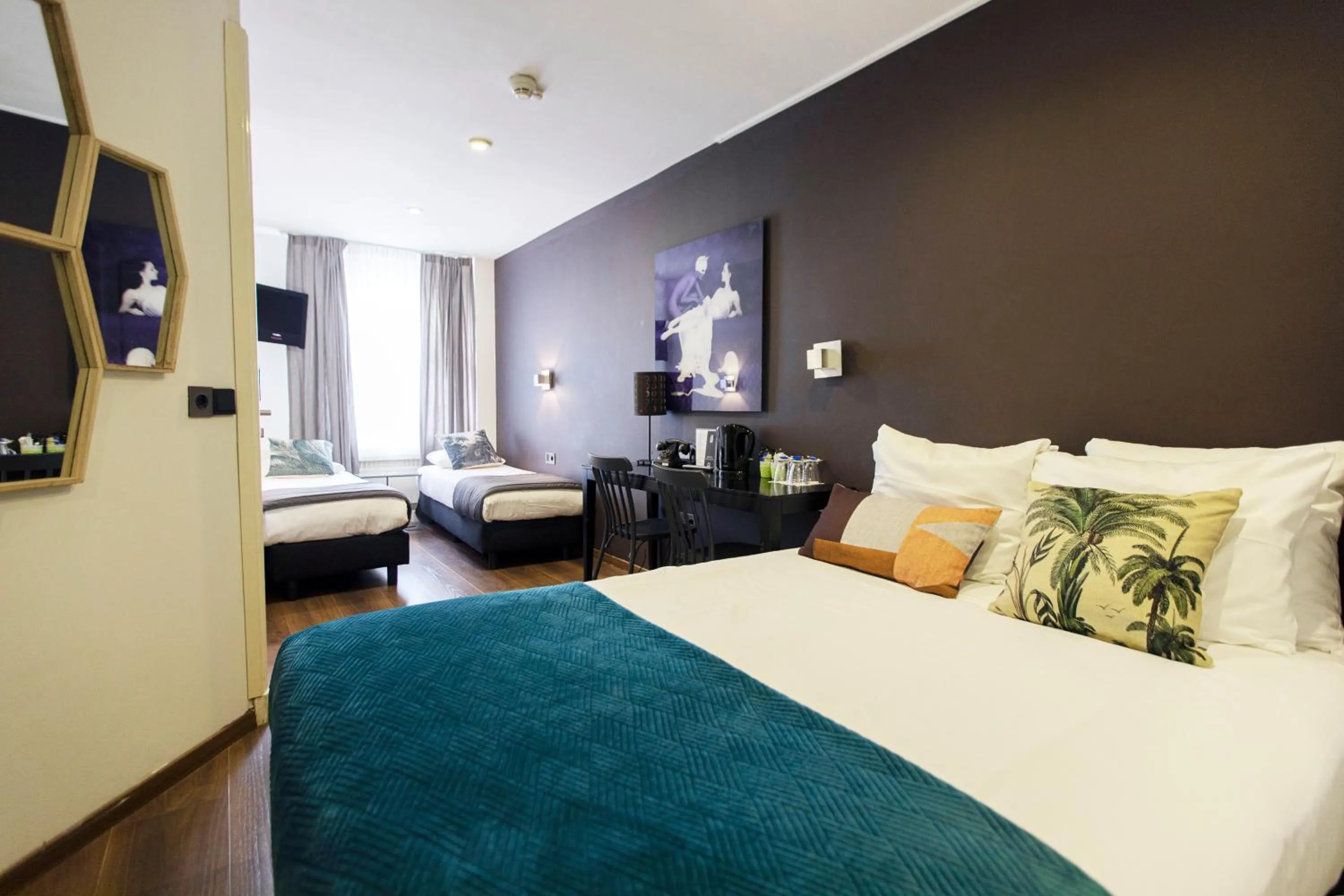 Bed in Quentin Amsterdam Hotel