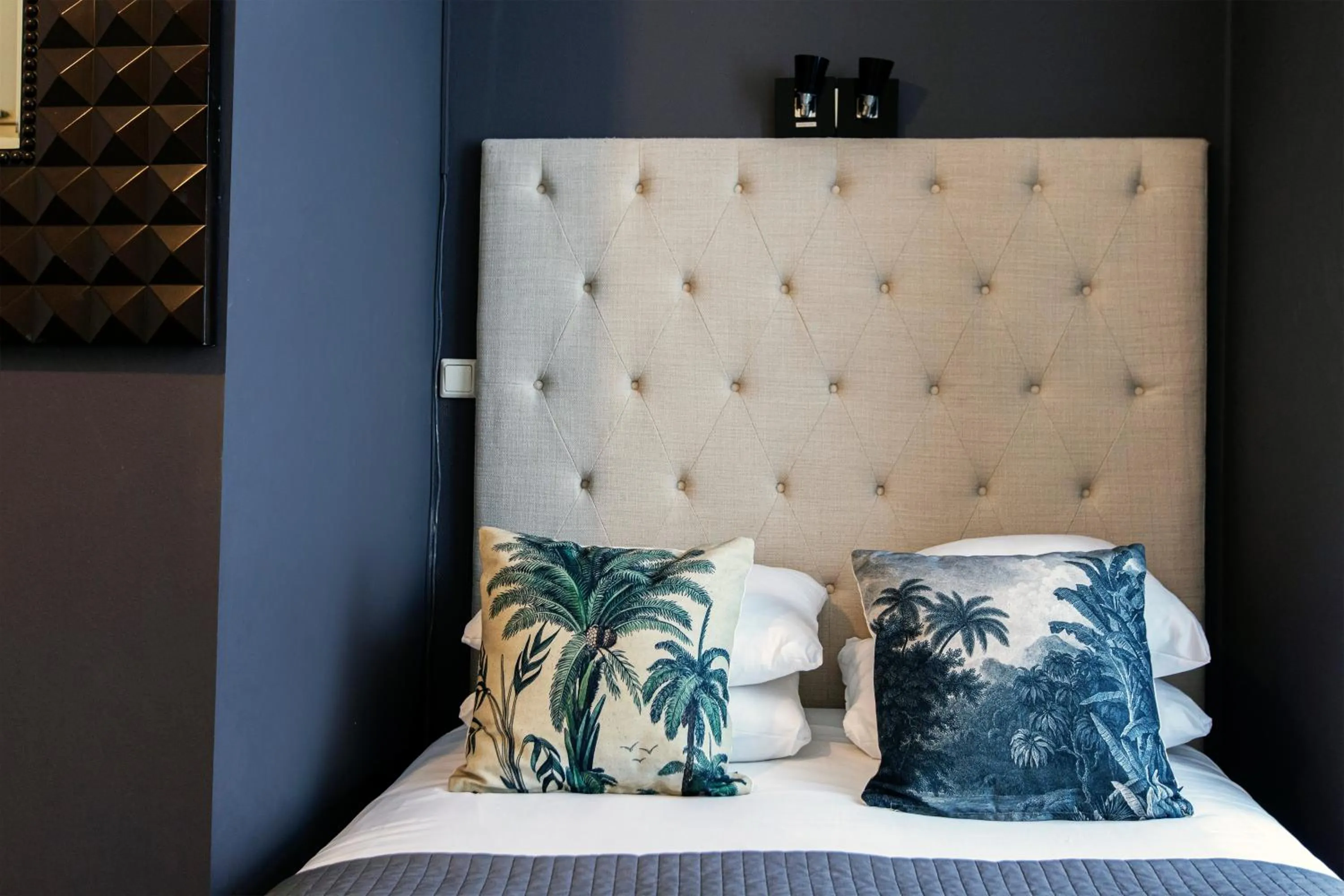 Bed in Quentin Amsterdam Hotel