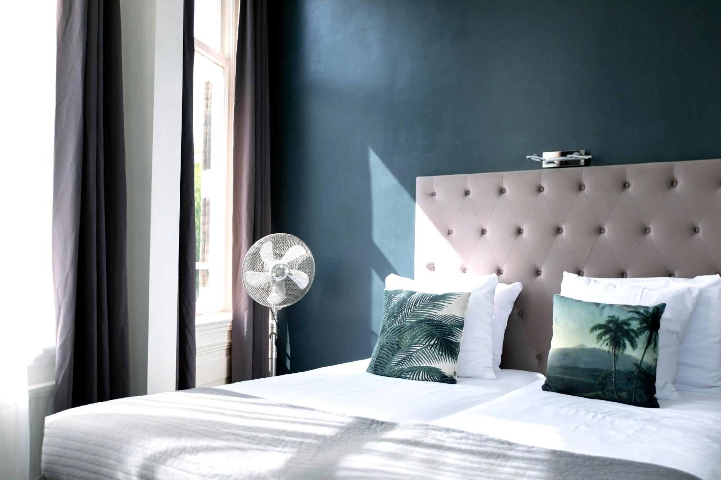 Bed in Quentin Amsterdam Hotel