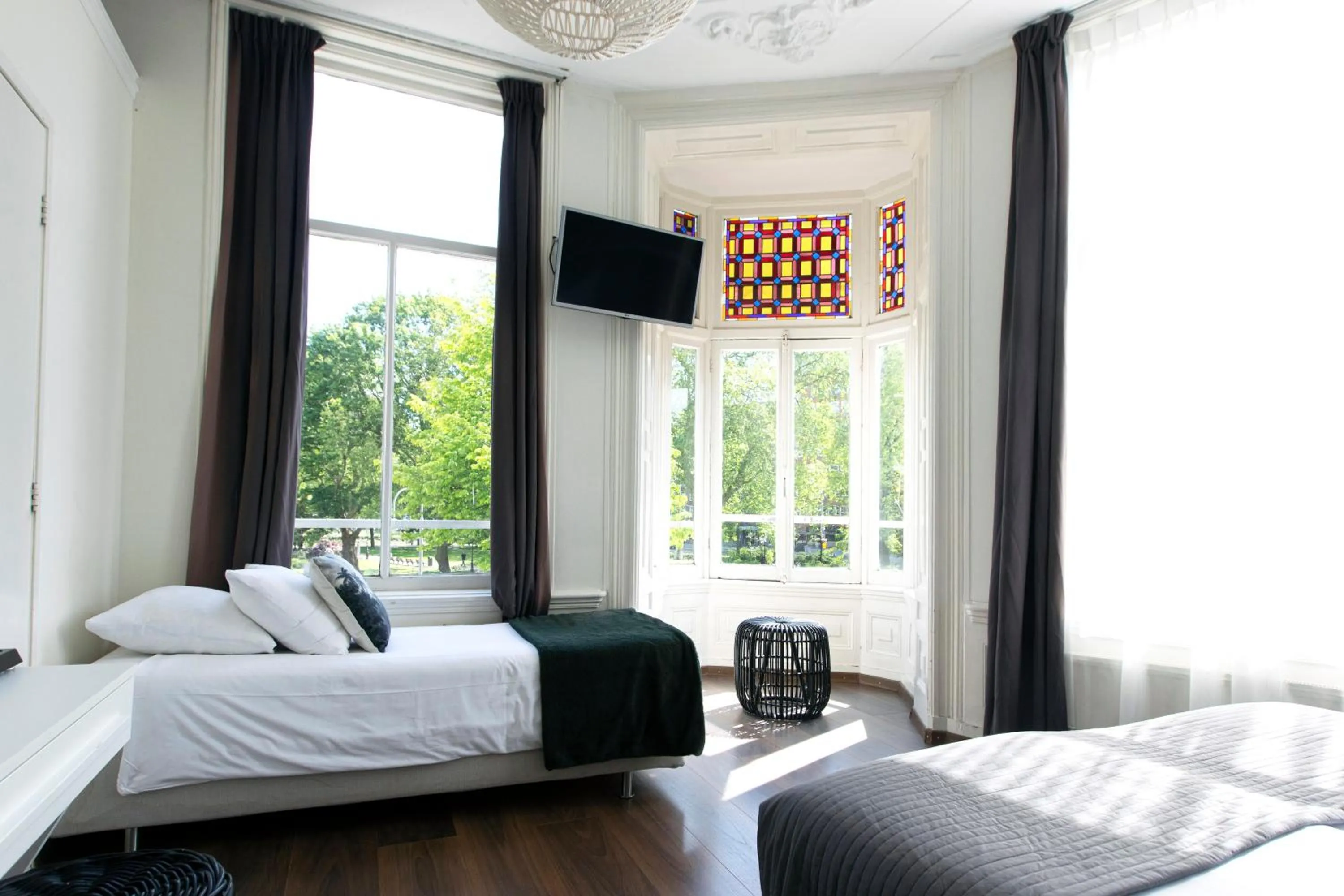 Bed in Quentin Amsterdam Hotel