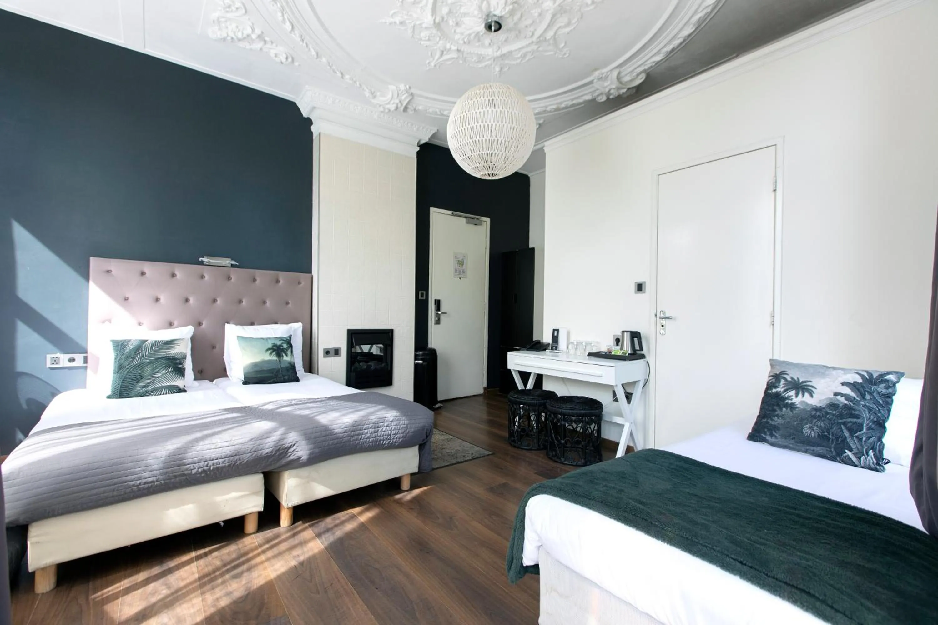 Bed in Quentin Amsterdam Hotel