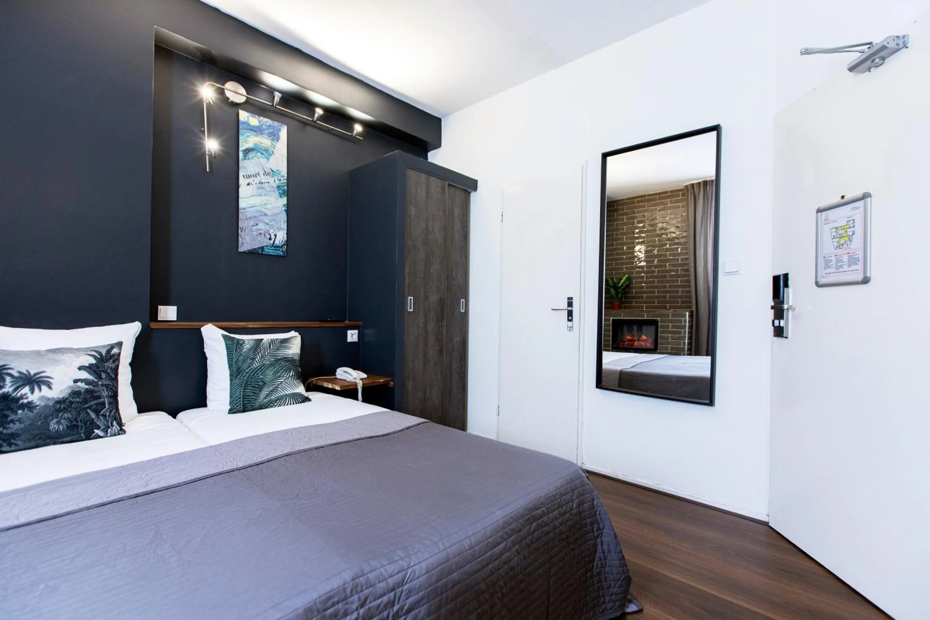 Bed in Quentin Amsterdam Hotel