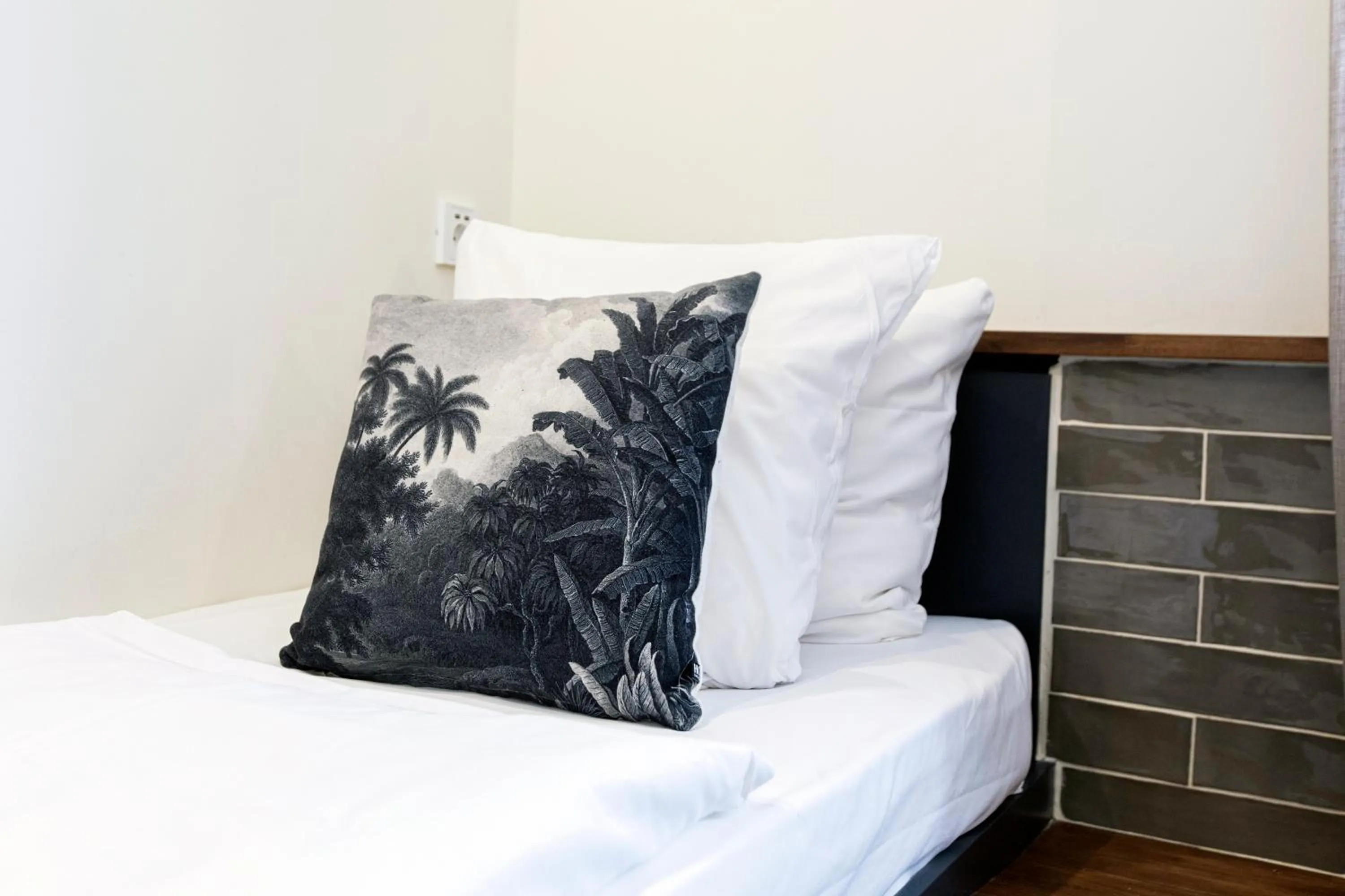 Bed in Quentin Amsterdam Hotel