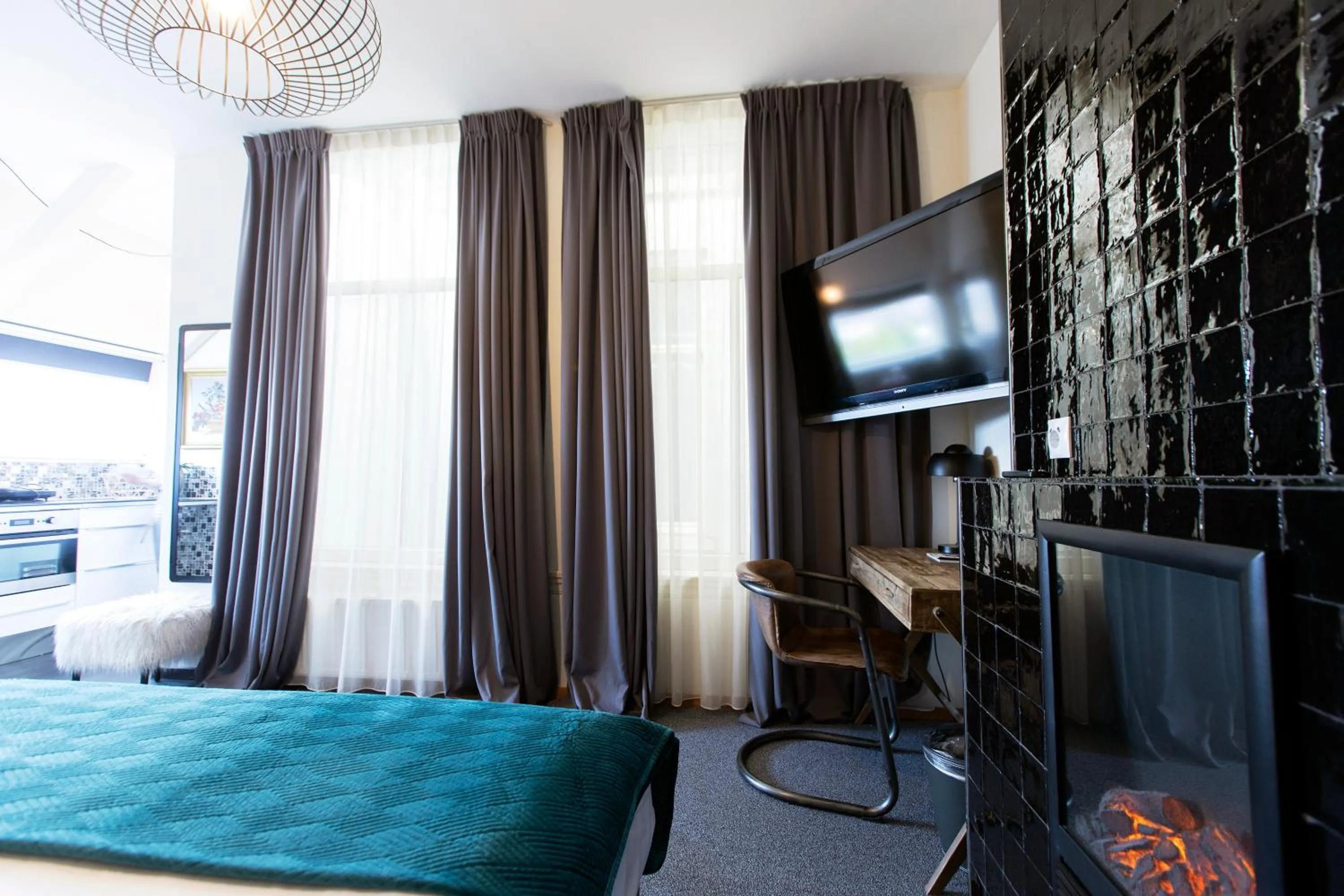 Bed in Quentin Amsterdam Hotel