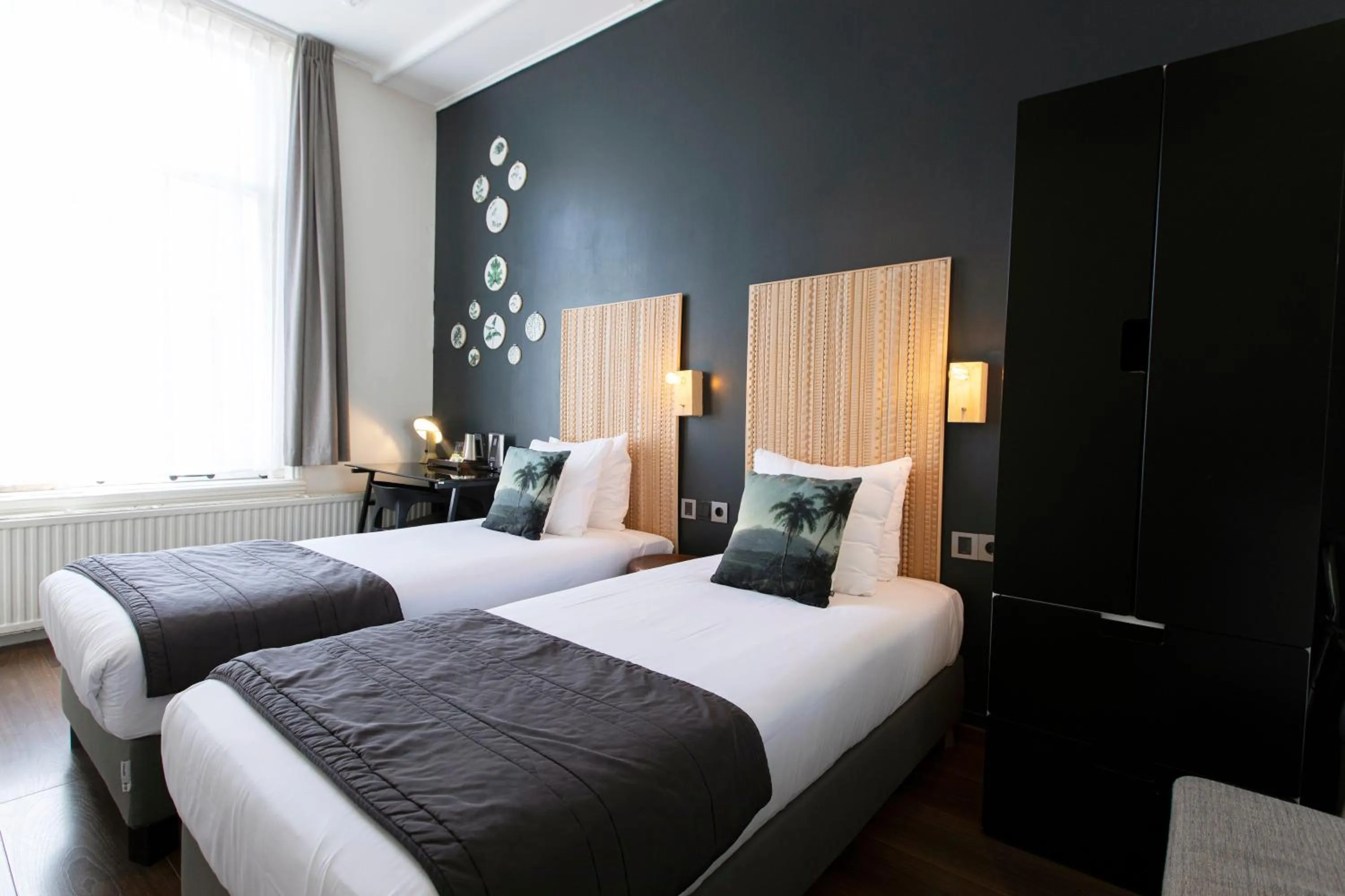 Bed in Quentin Amsterdam Hotel