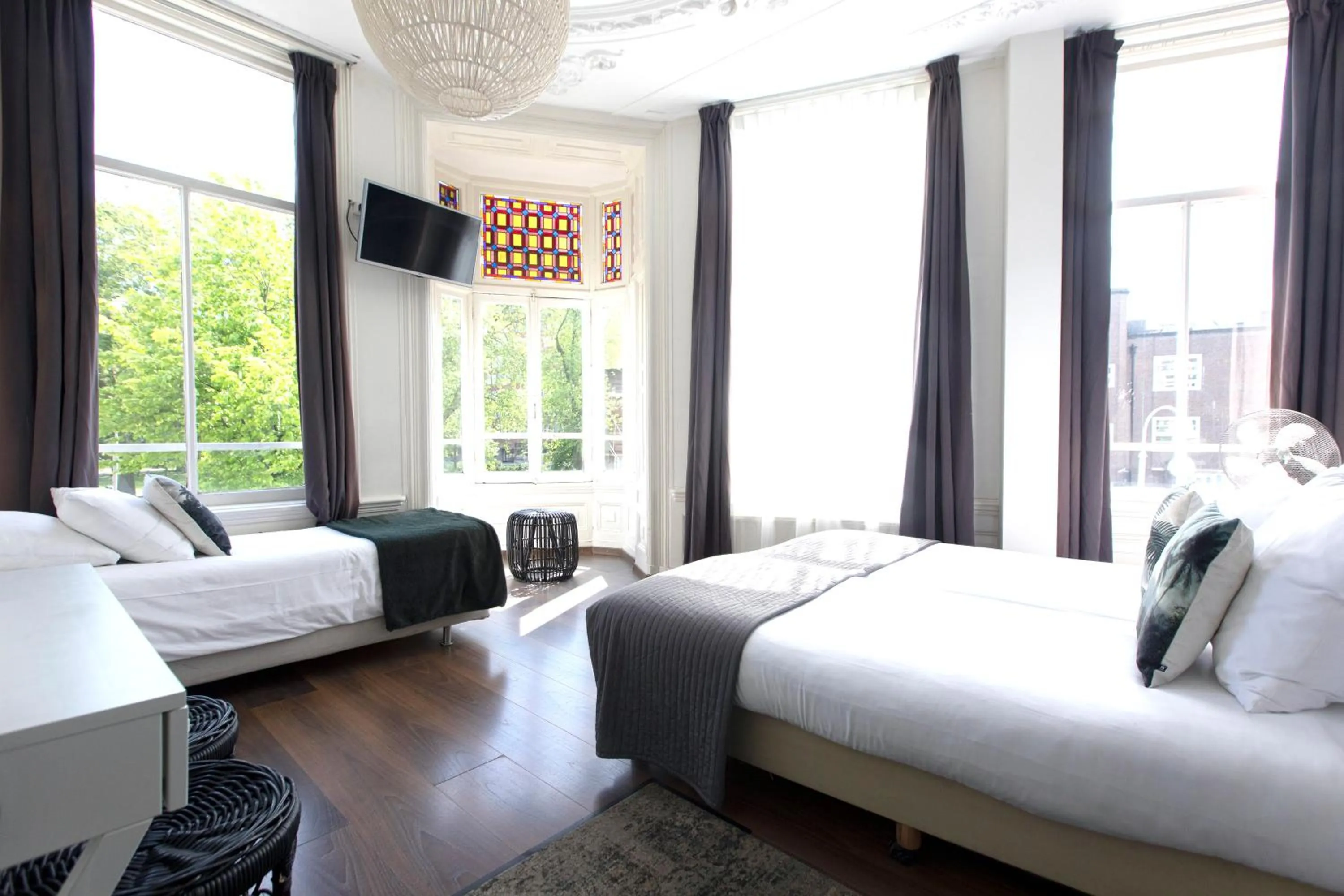 Bed in Quentin Amsterdam Hotel