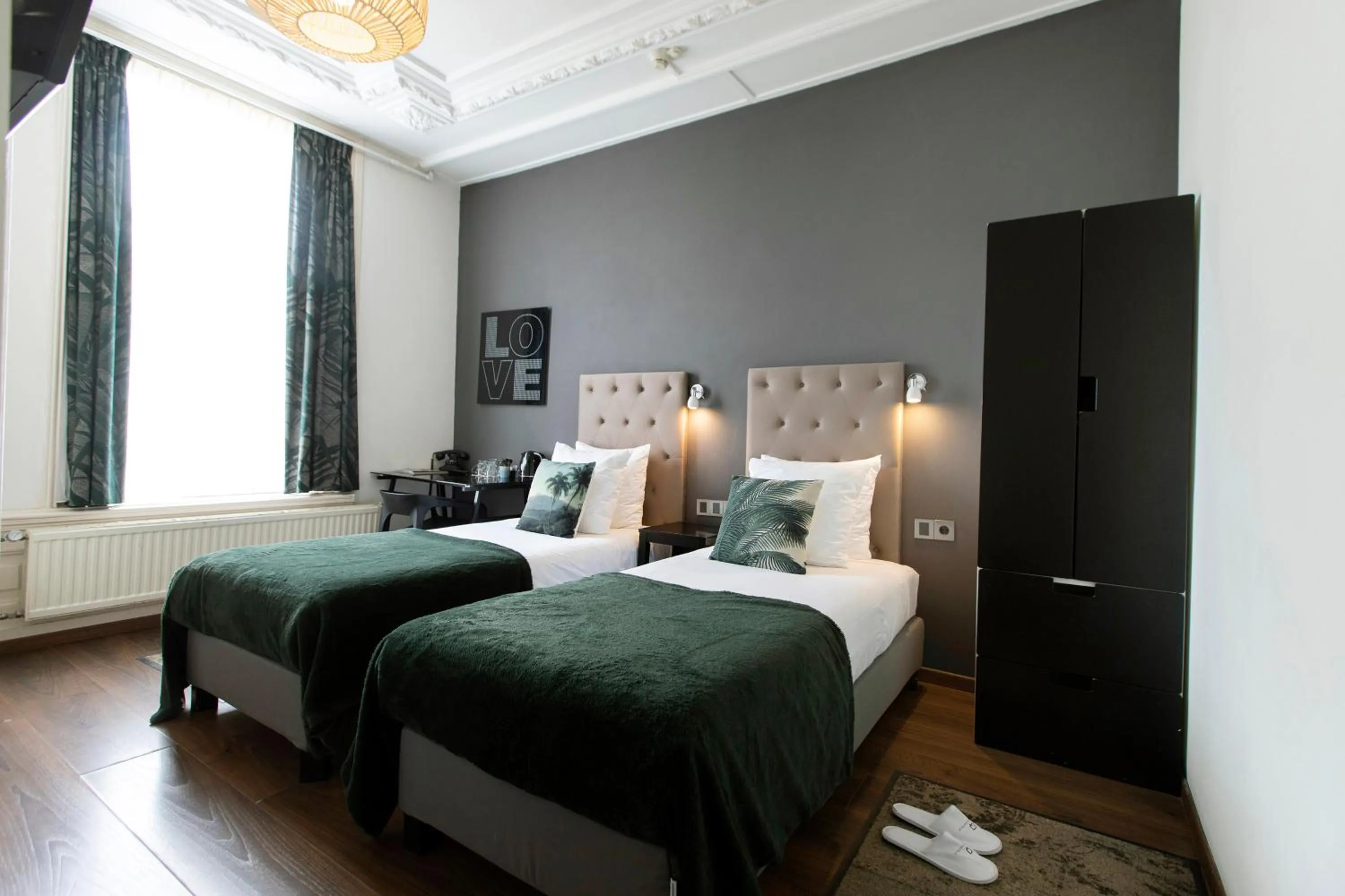 Bed in Quentin Amsterdam Hotel