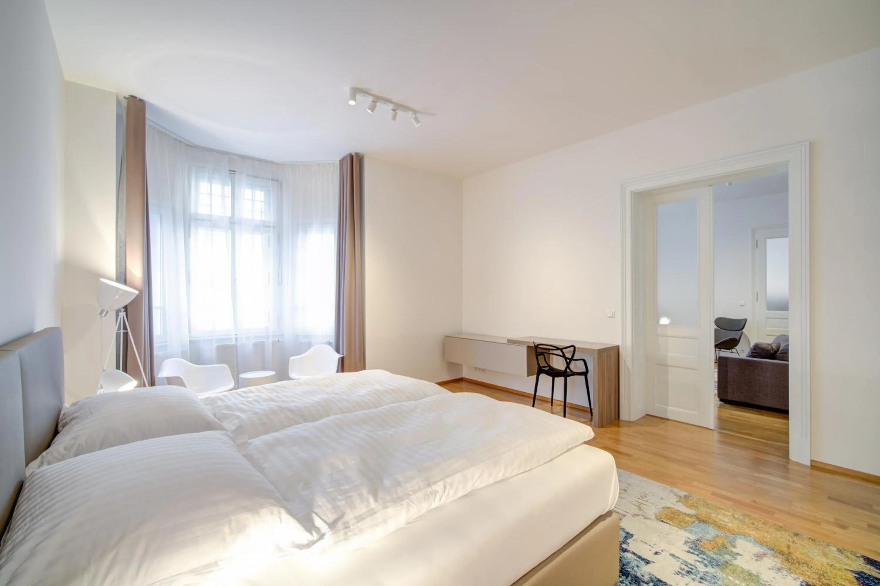 Bed in Bishop Apartments