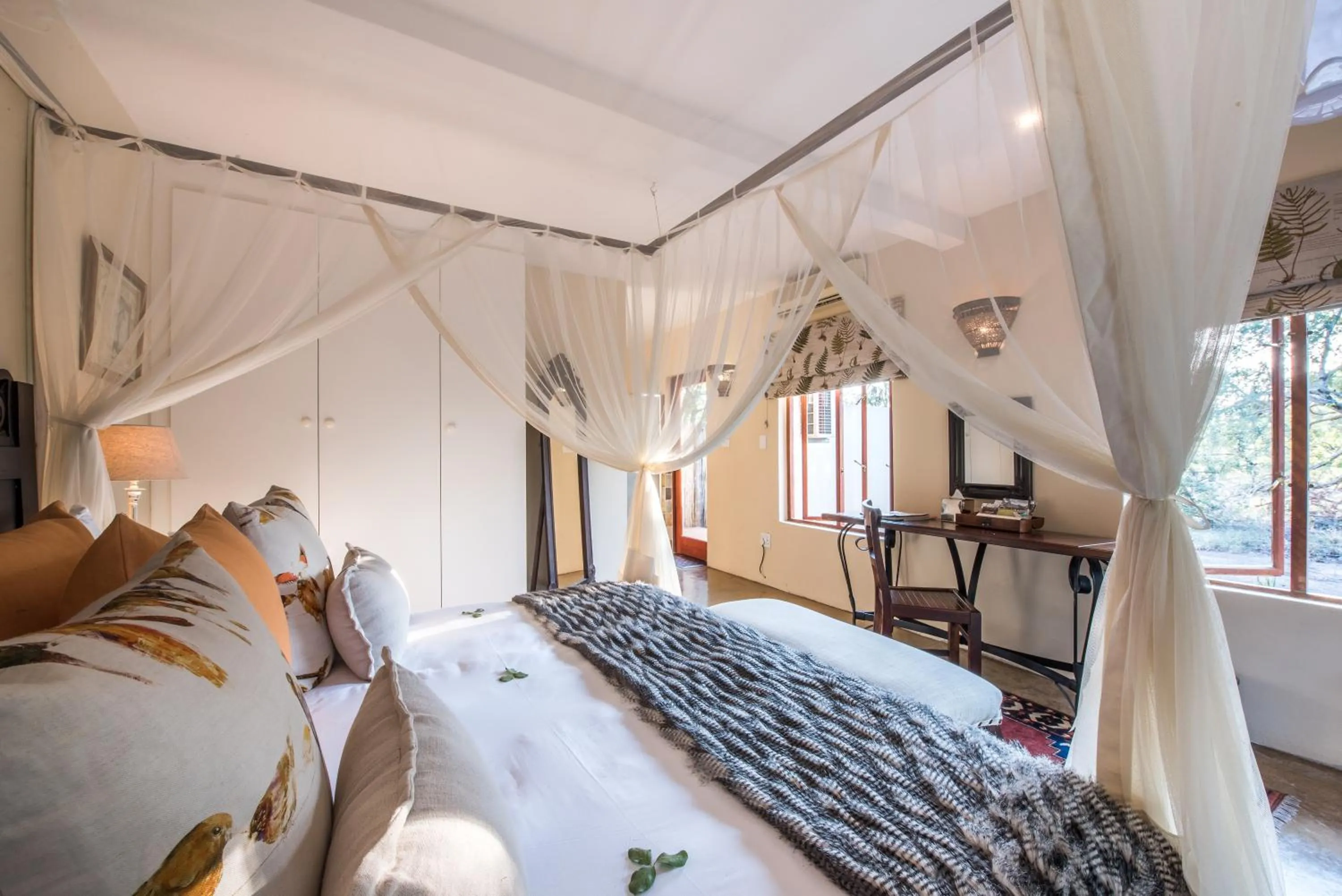 Bed in Tintswalo Safari