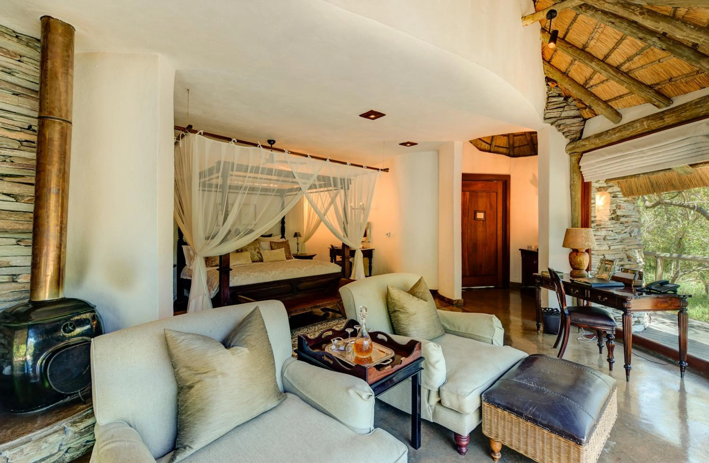 Bed in Tintswalo Safari