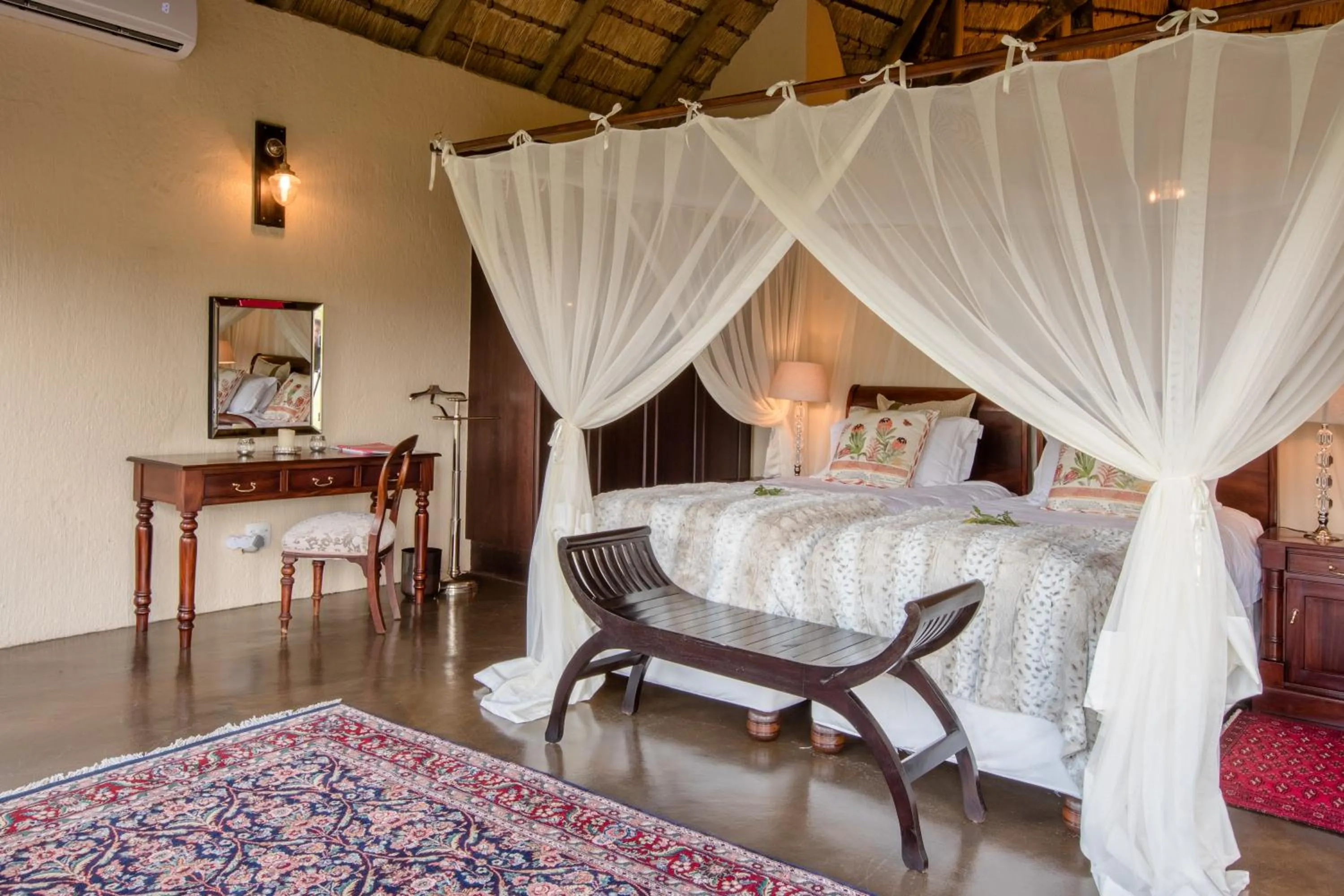 Bed in Tintswalo Safari