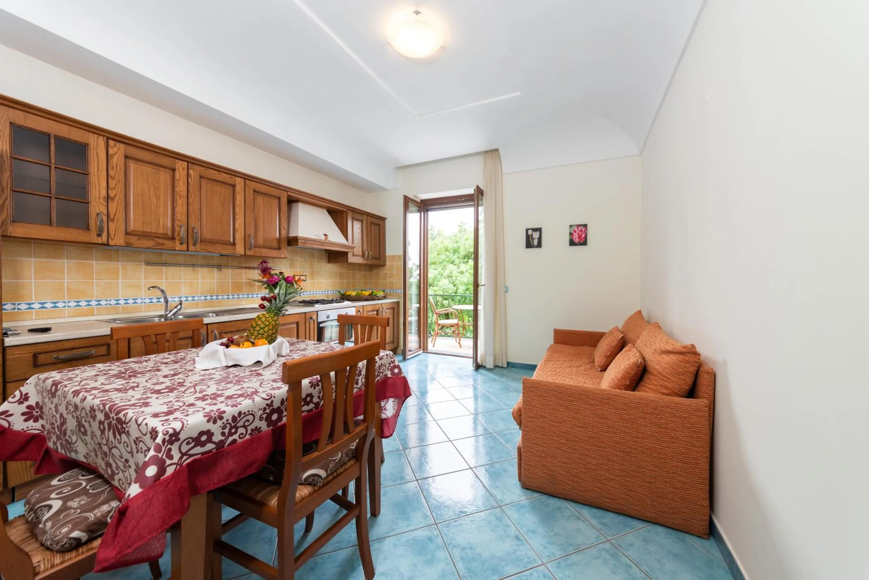 Kitchen or kitchenette in La Capannina - Hotel & Apartments