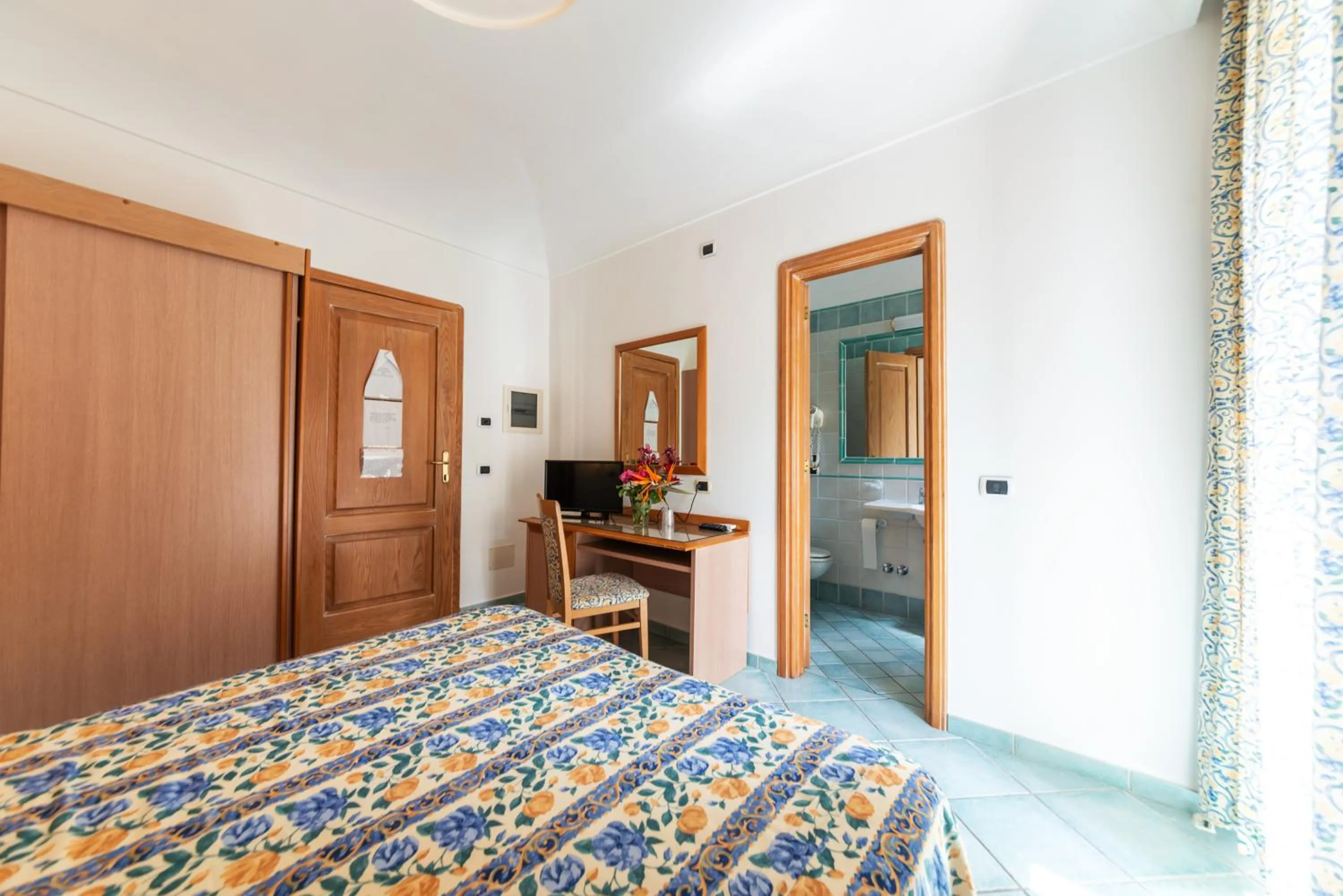 Bedroom, Bed in La Capannina - Hotel & Apartments