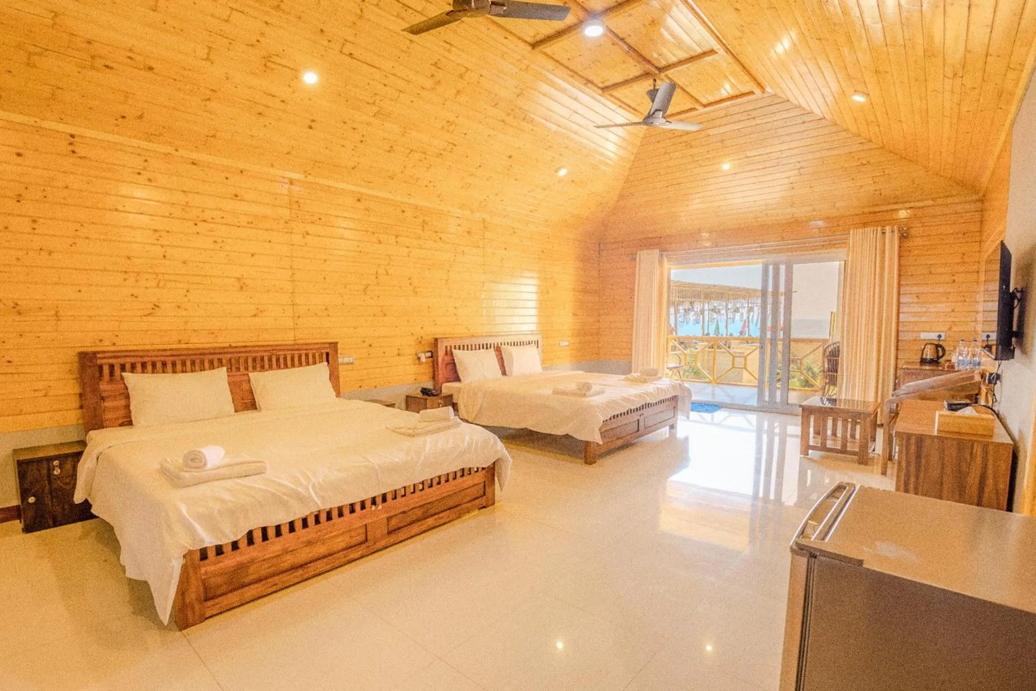 Bed in The O2H Agonda Beach Resort