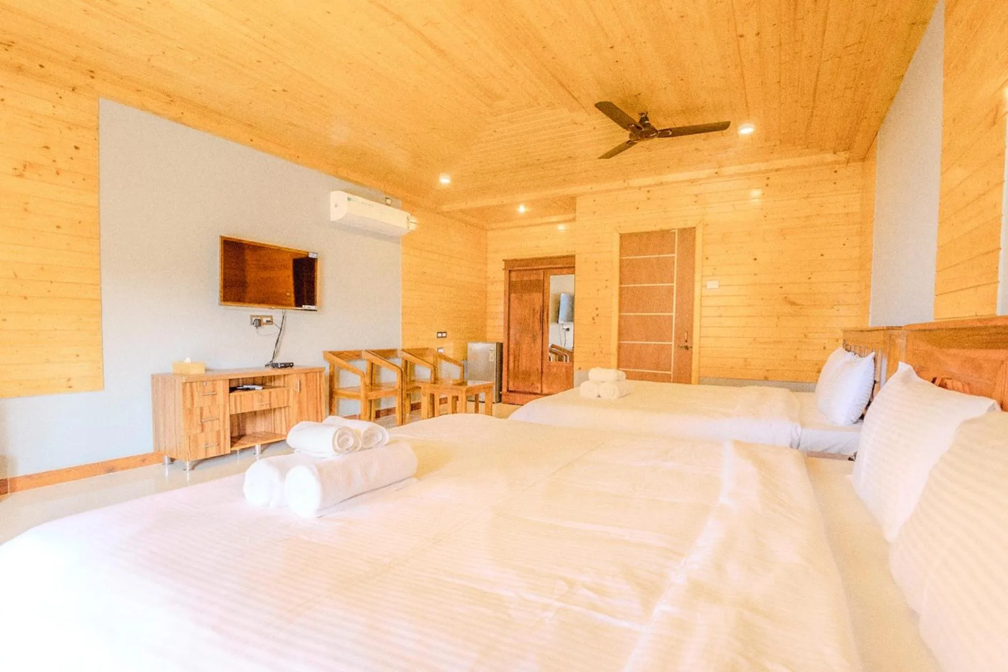 Bed in The O2H Agonda Beach Resort