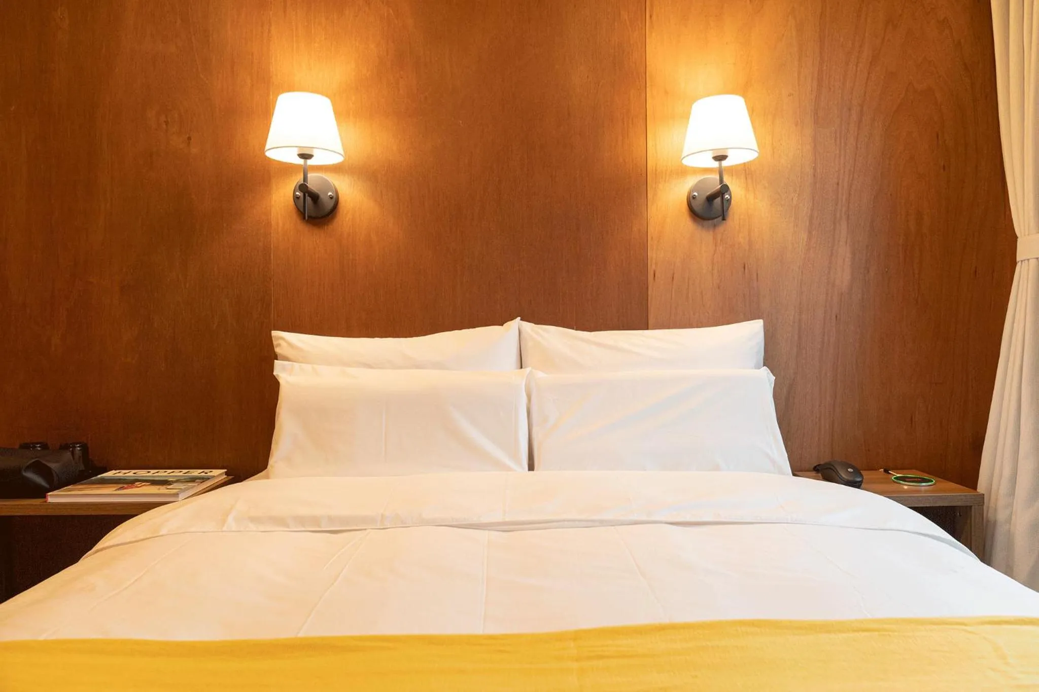 Bed in Nouvelle Hotel Seoul Itaewon by Aank