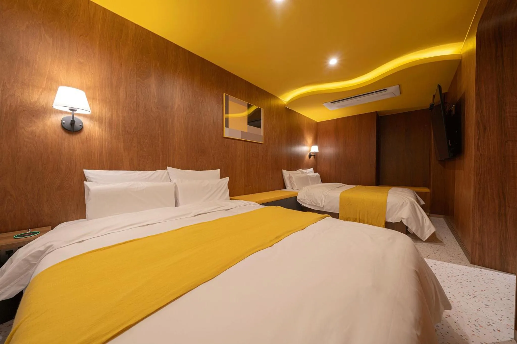 Bed in Nouvelle Hotel Seoul Itaewon by Aank