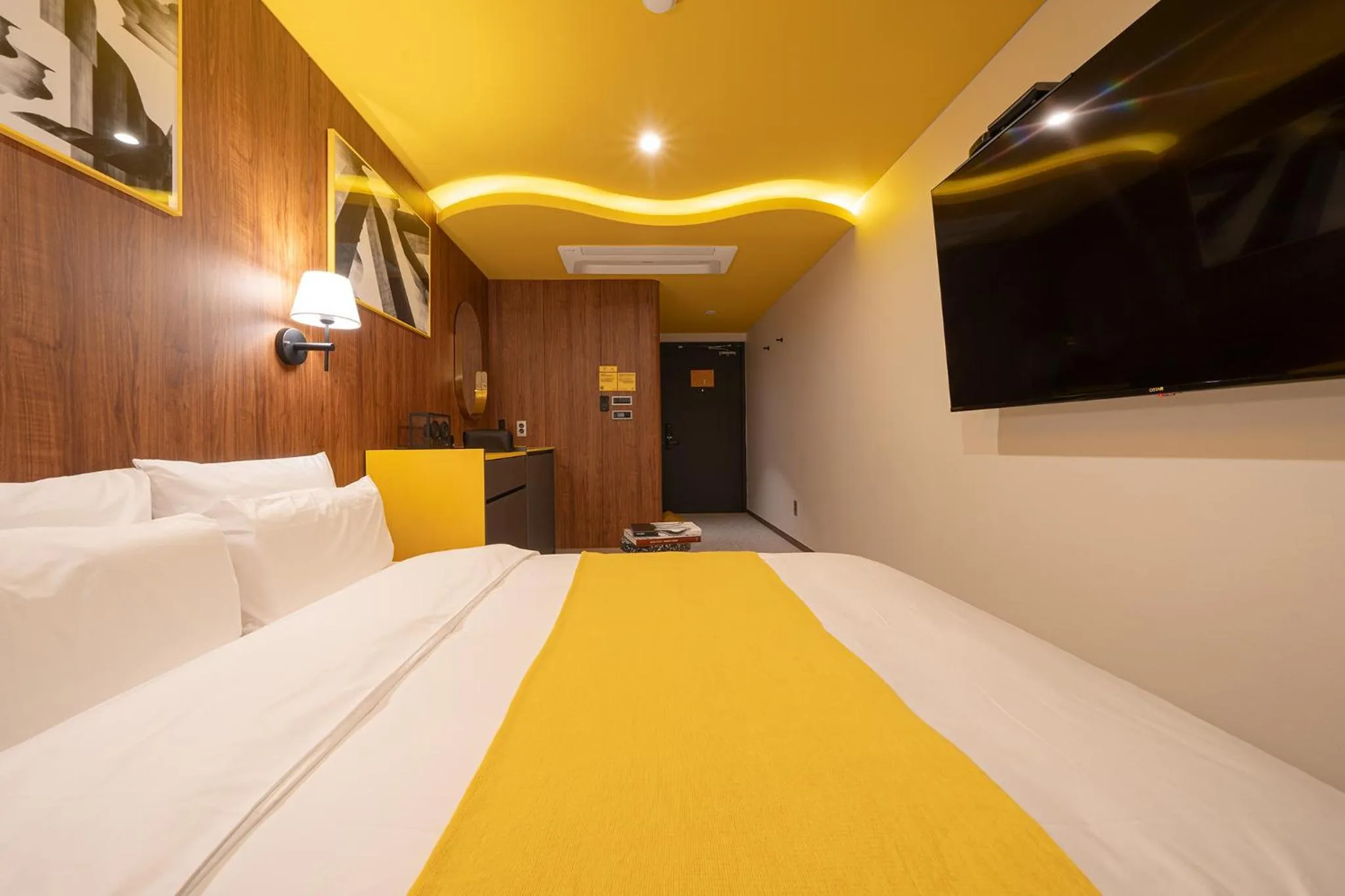 Bed in Nouvelle Hotel Seoul Itaewon by Aank