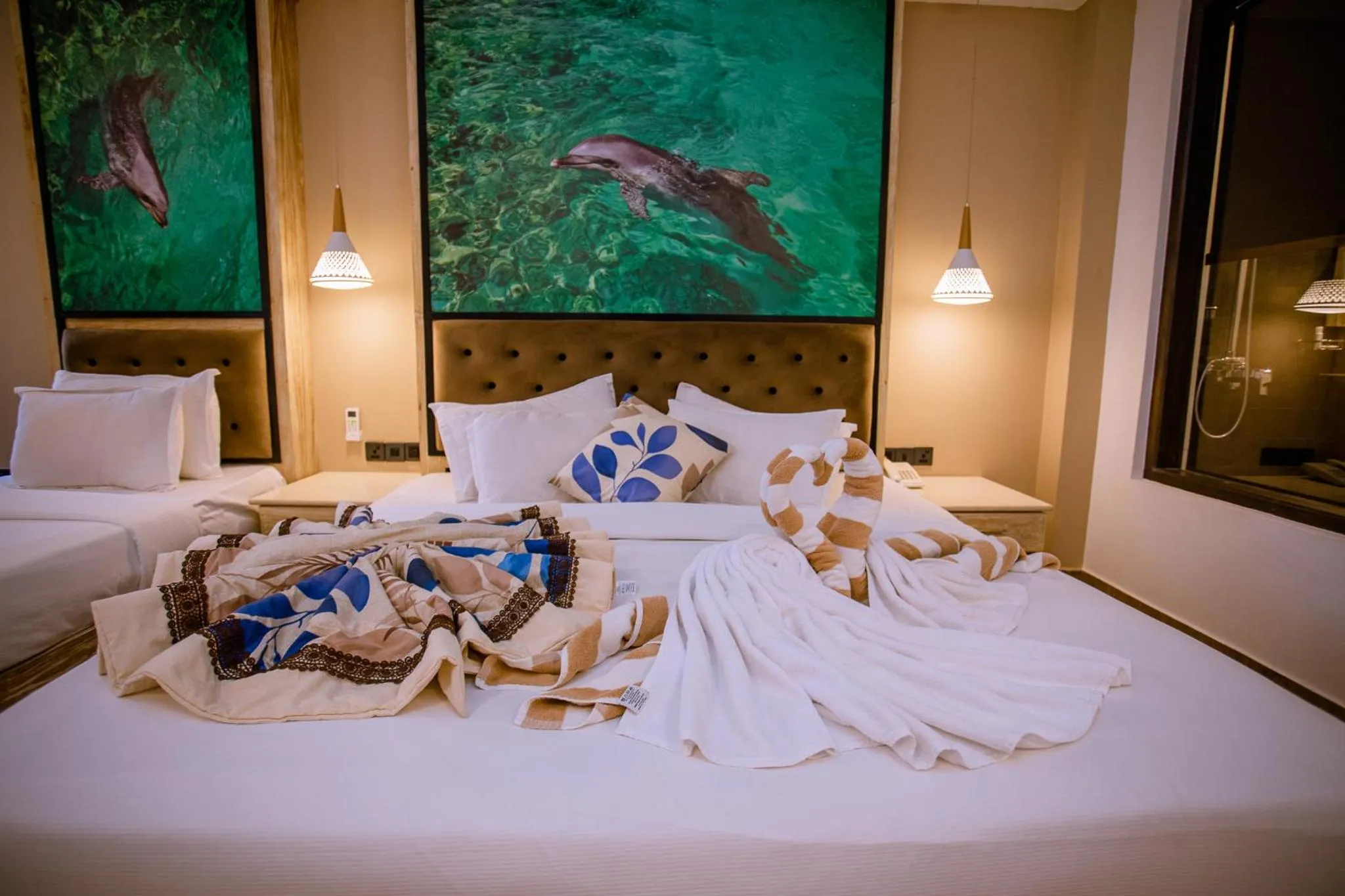 Bed in Emerald Bay Resort Mirissa