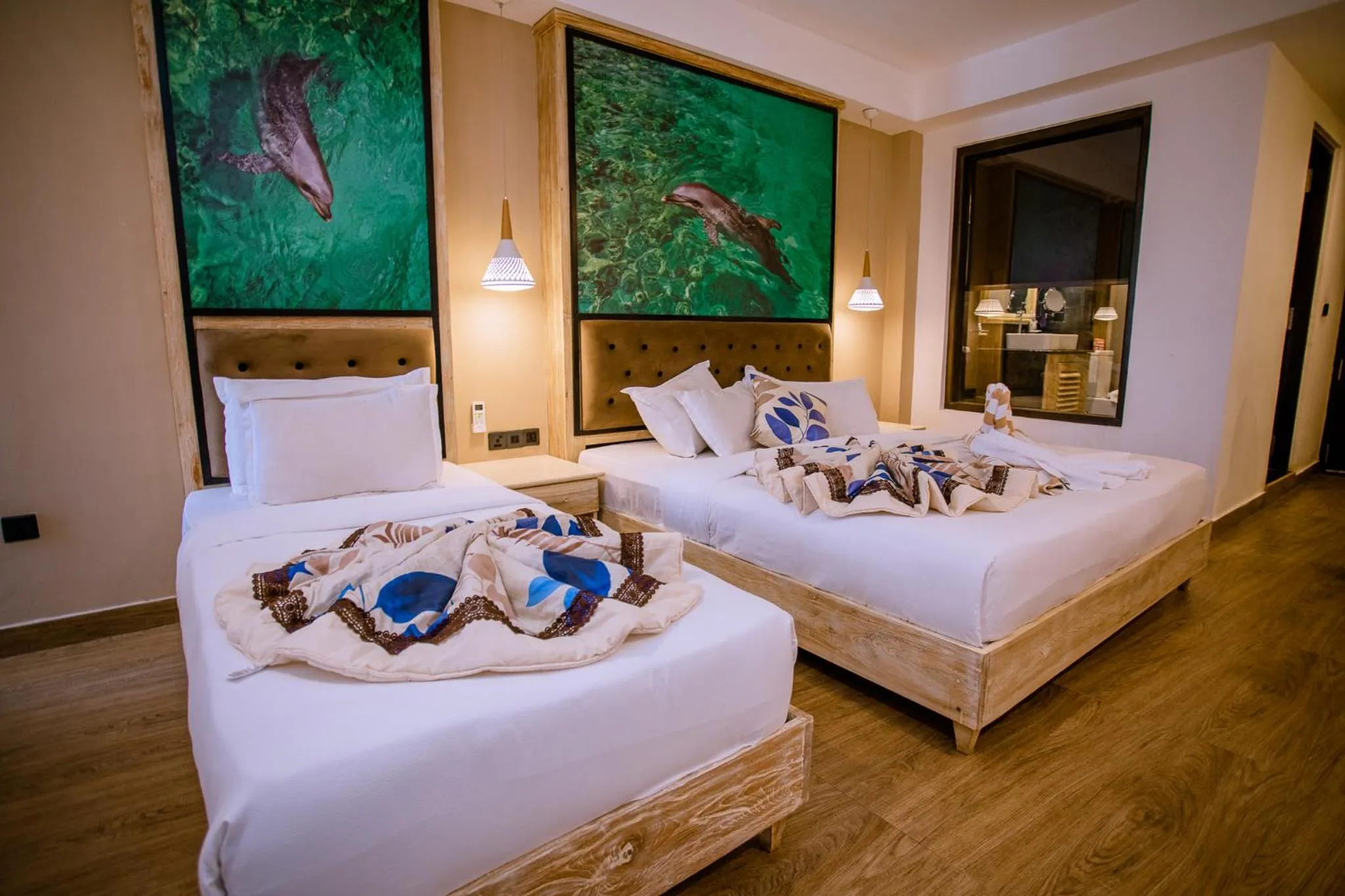 Bed in Emerald Bay Resort Mirissa