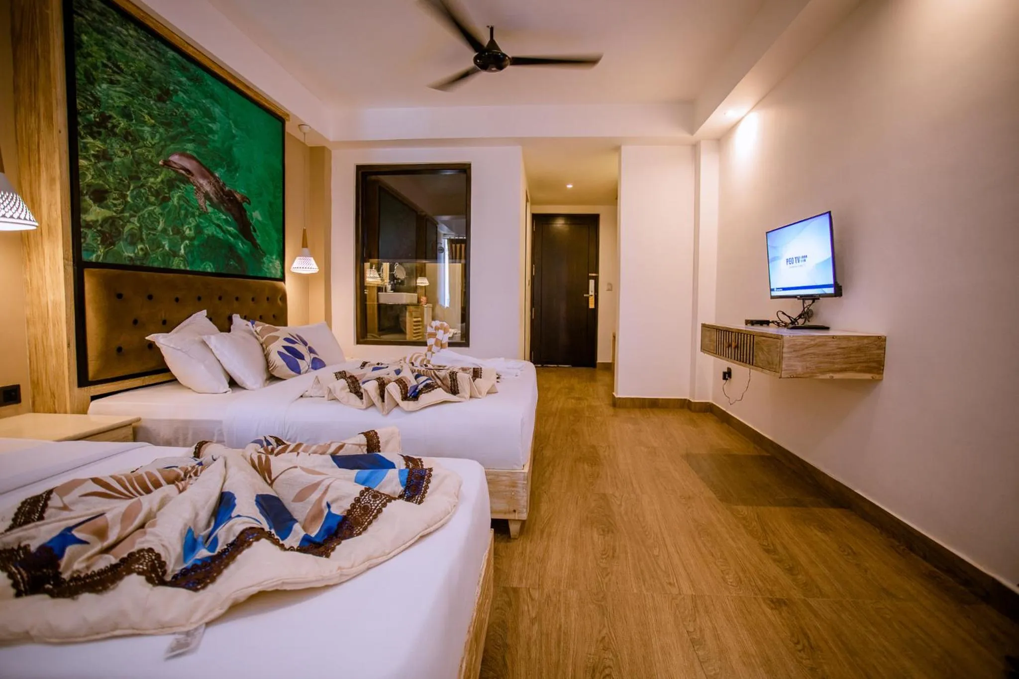 Bed in Emerald Bay Resort Mirissa