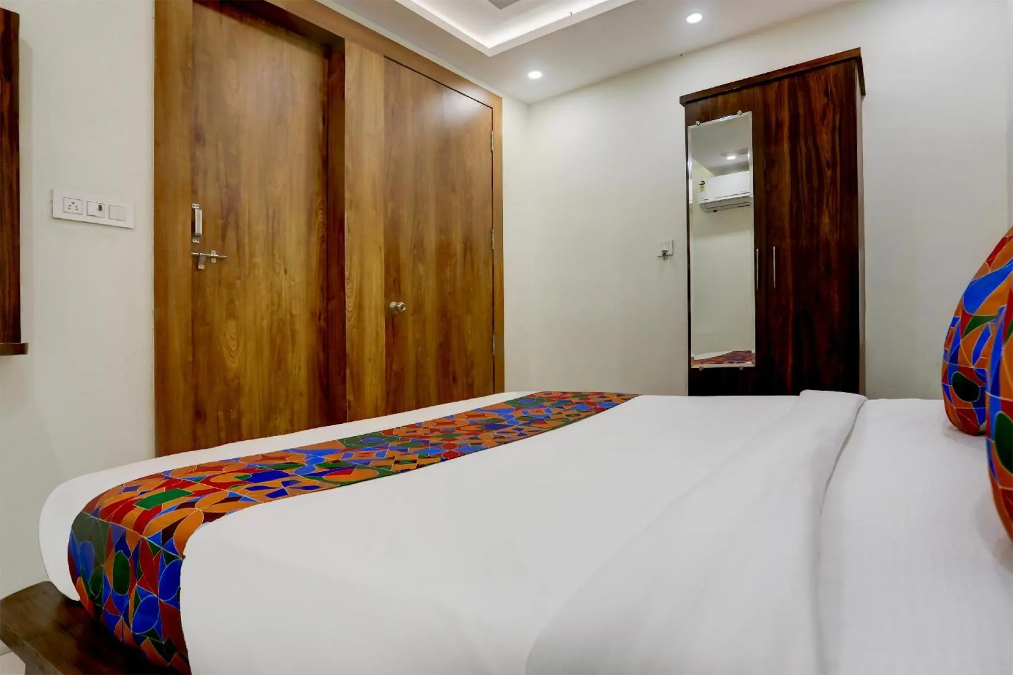 Bed in FabHotel Oriental