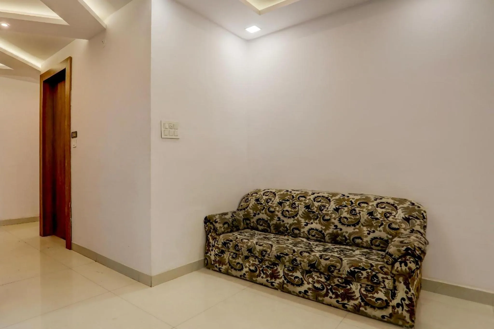 Seating area, Bed in FabHotel Oriental