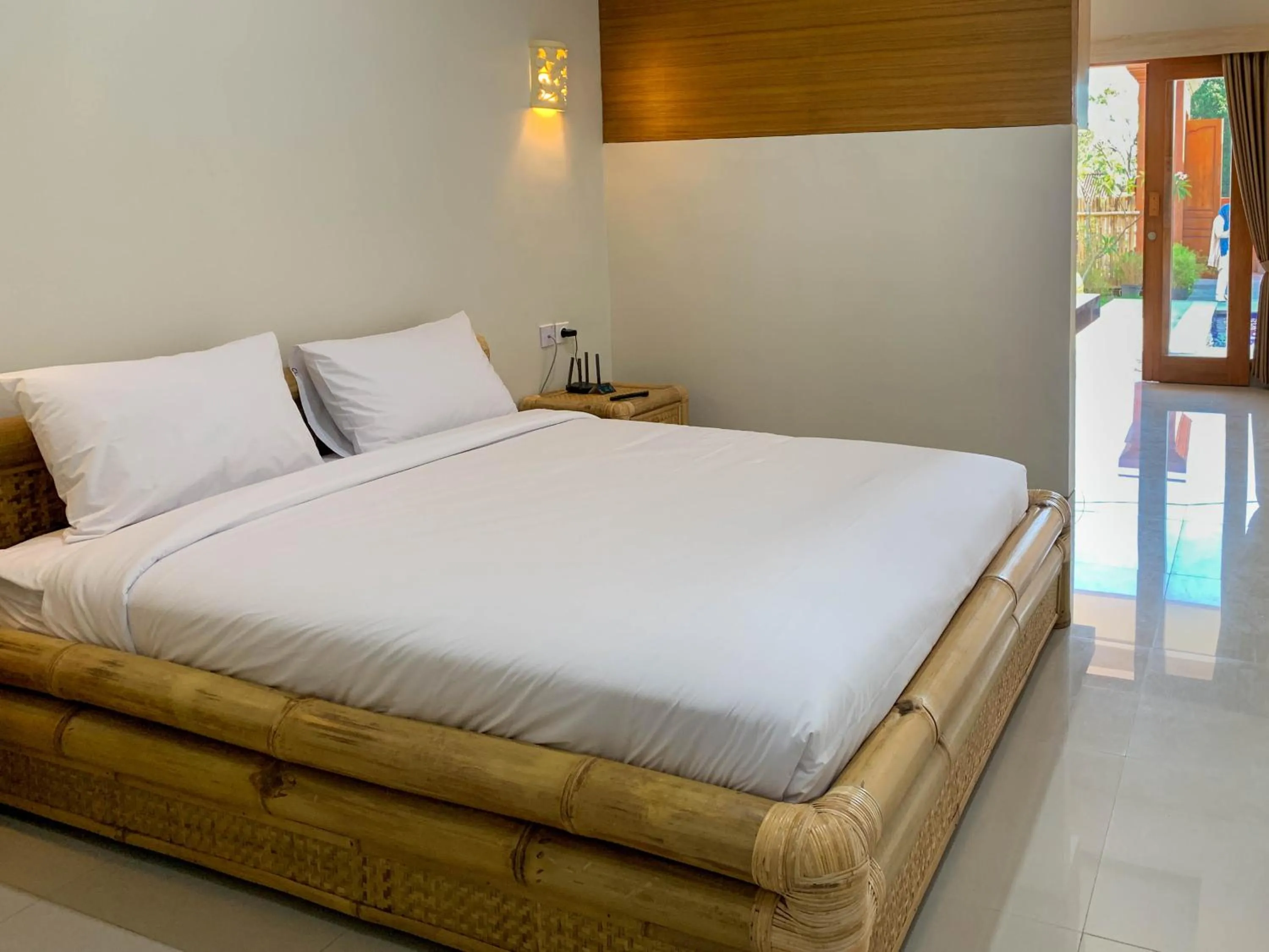 Bed in Candra Loka Studio & Apartment by The Loka